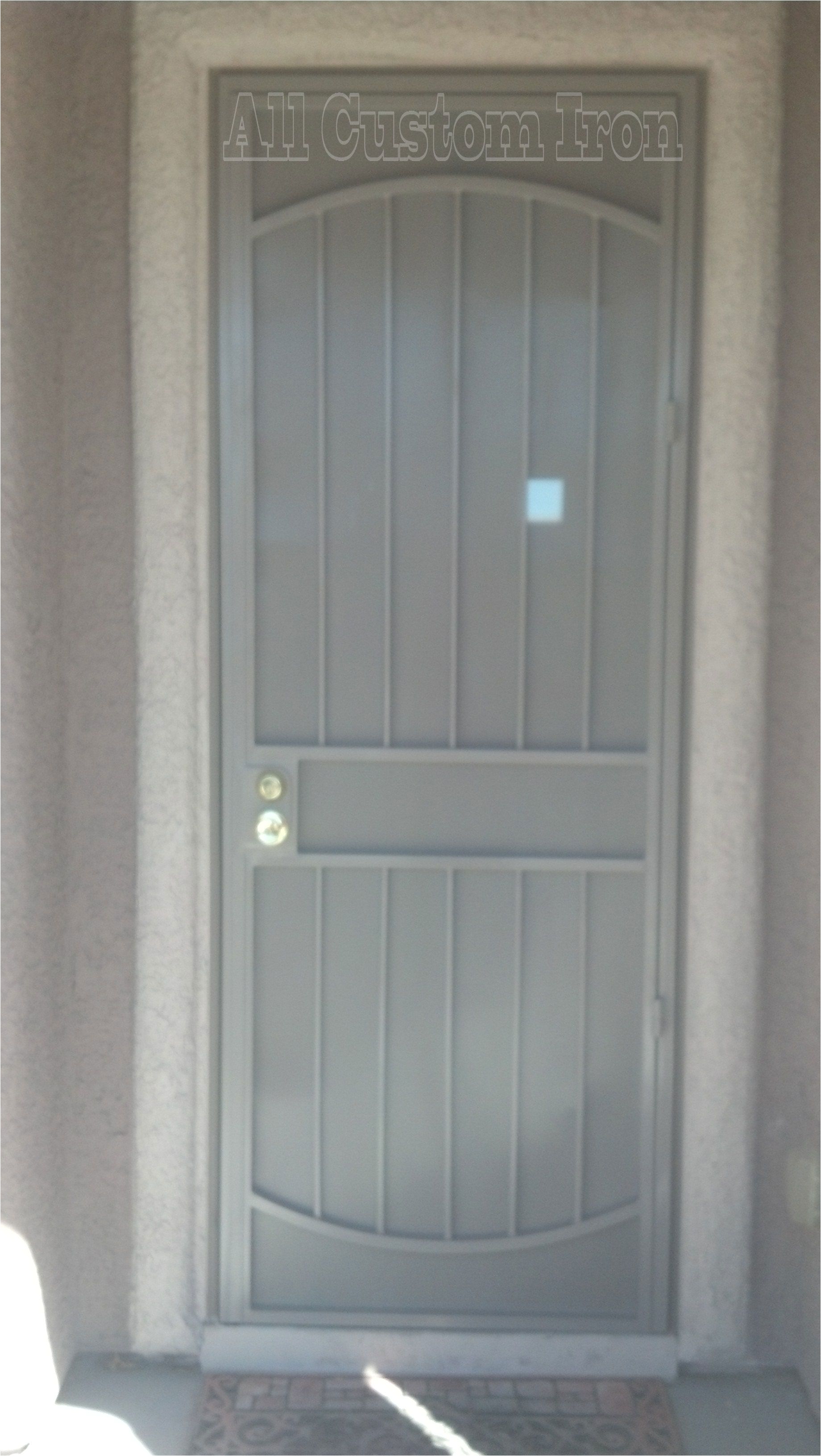 this is a 36 x 96 iron security door with double arches http