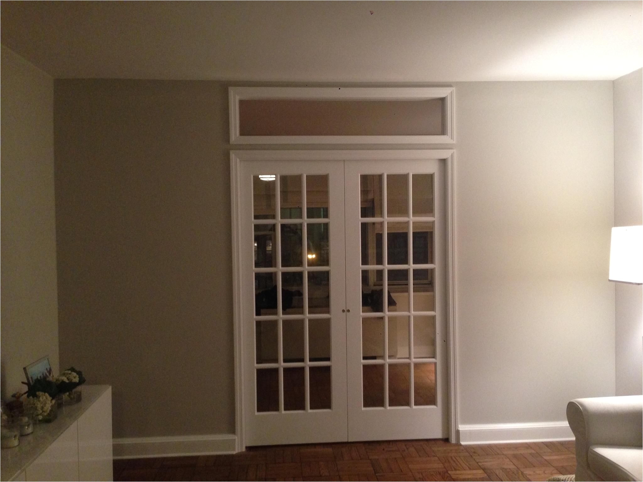 custom temporary wall system with double french doors and borrowed light window we recently installed in nyc apartment for more information and free