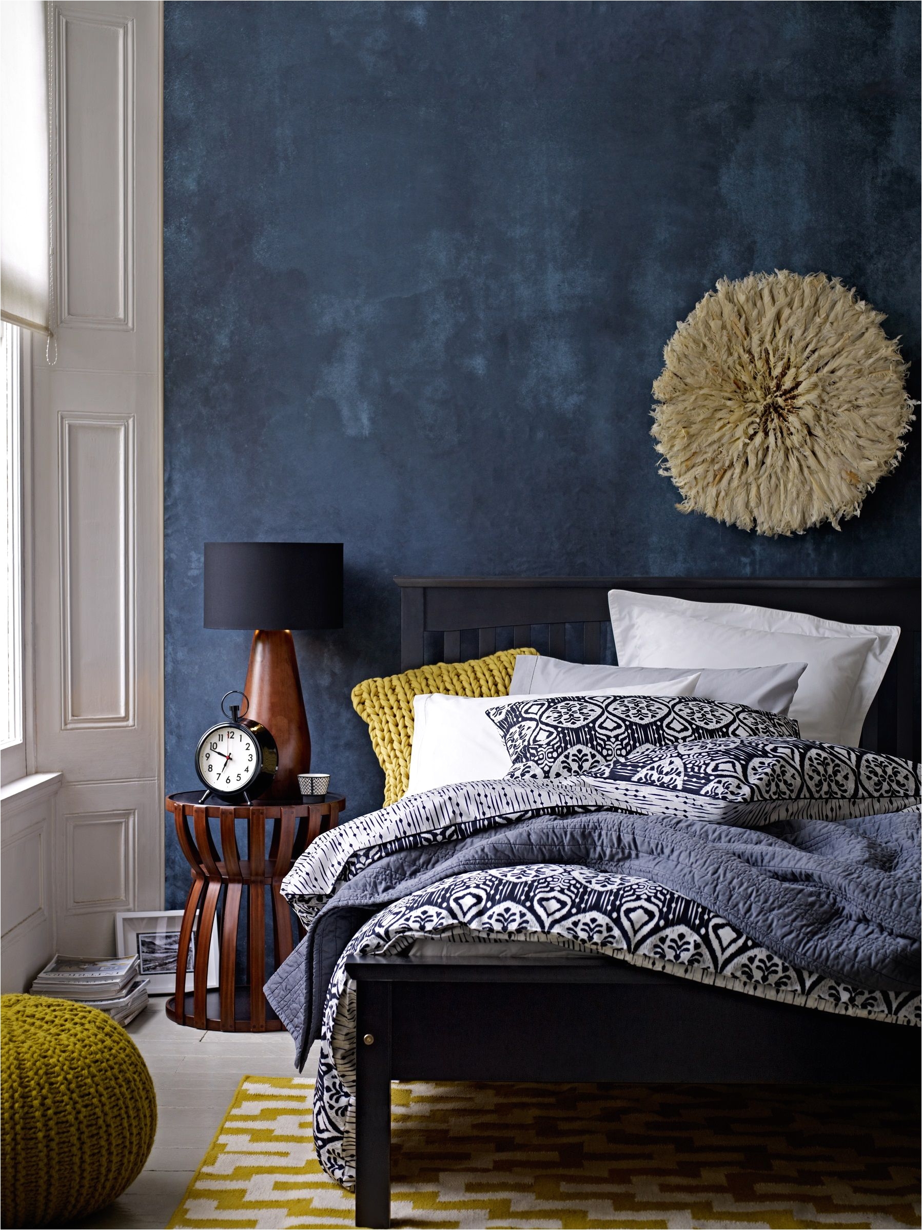 deep blue accent wall in modern eclectic bedroom gorgeous use of color with wall and bedding