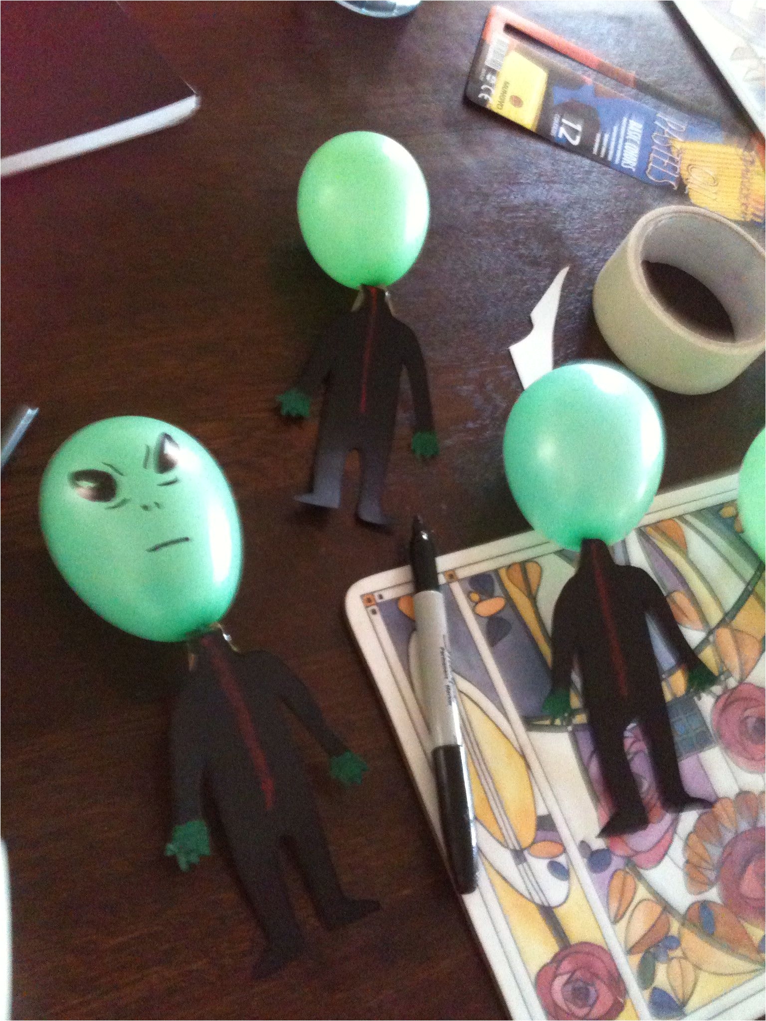 easy aliens made out of balloons and cardboard great for halloween decorations