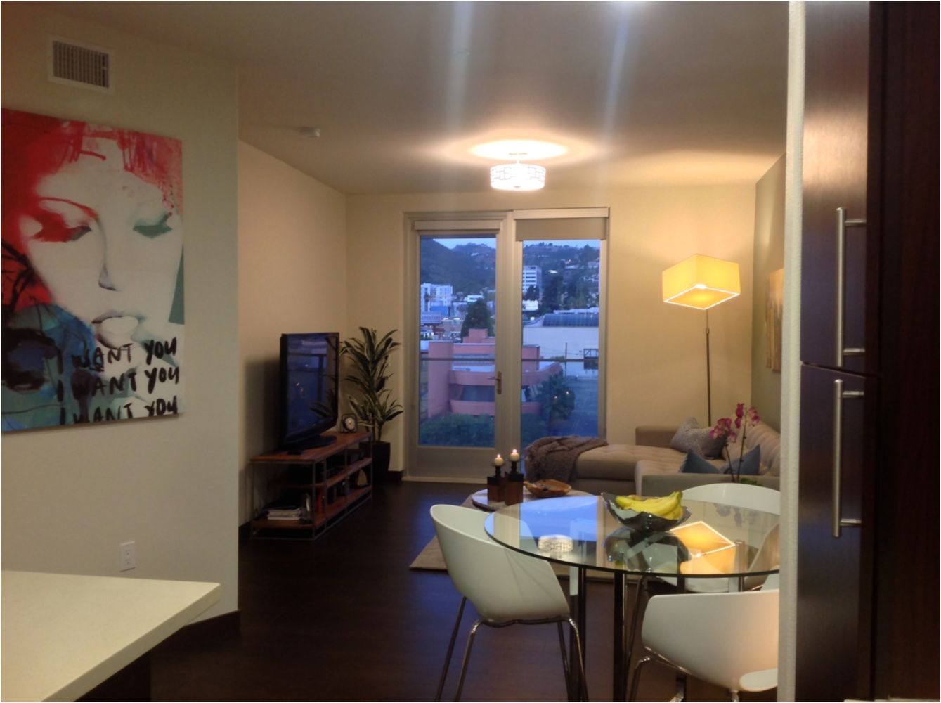 west hollywood rented condo for a young male professional after we created accent walls with paint along with the new pieces to give our client a hip