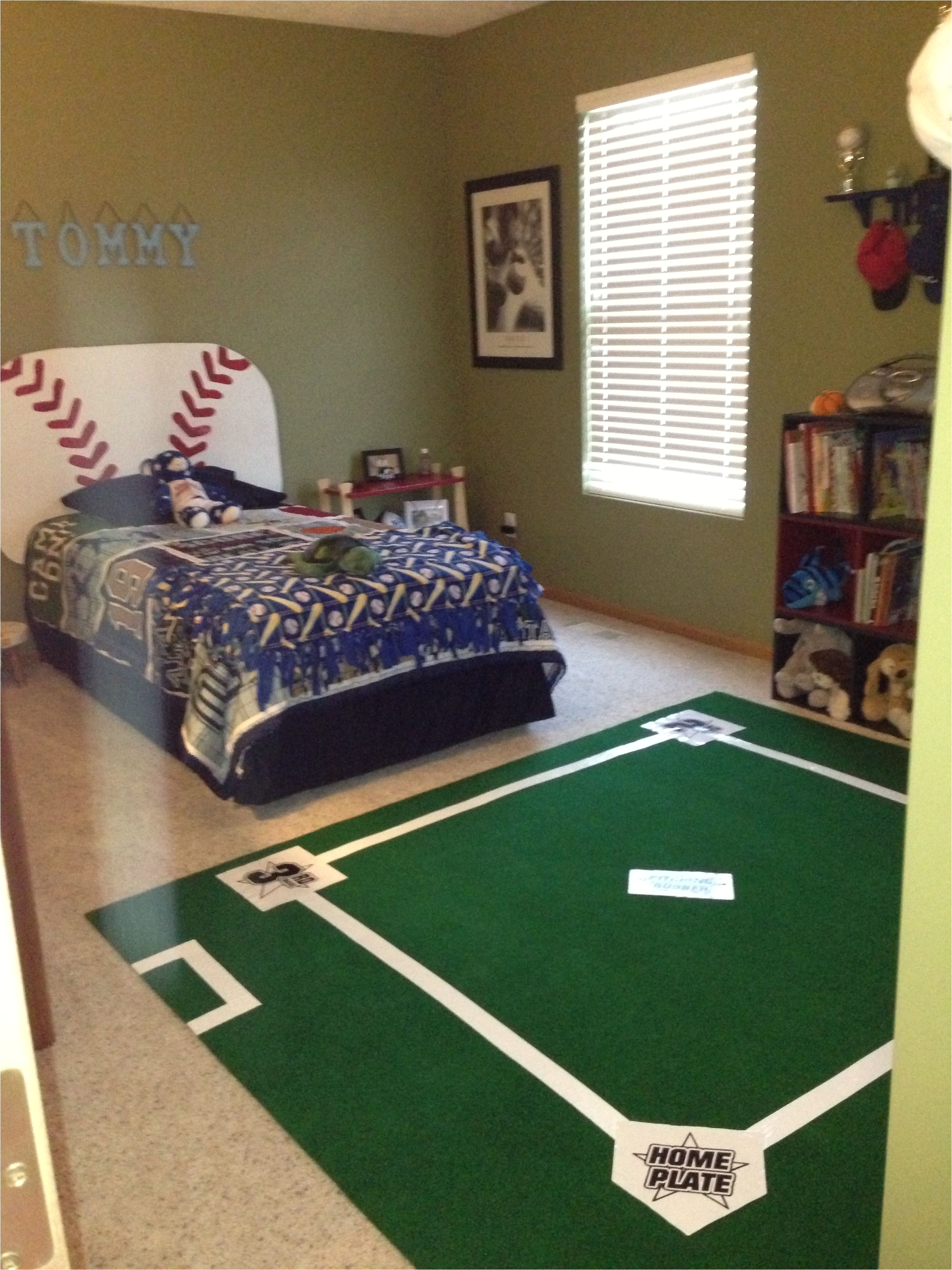 diy baseball field rug for baseball lovers room went to menards and got 6 x 7 golf green used white duck tape to create baselines and dugout