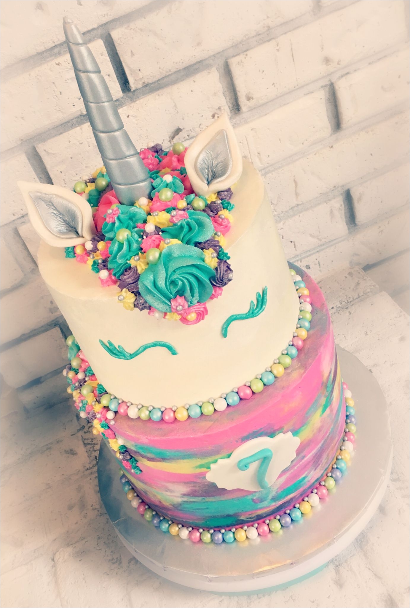 unicorn rainbow buttercream tiered cake