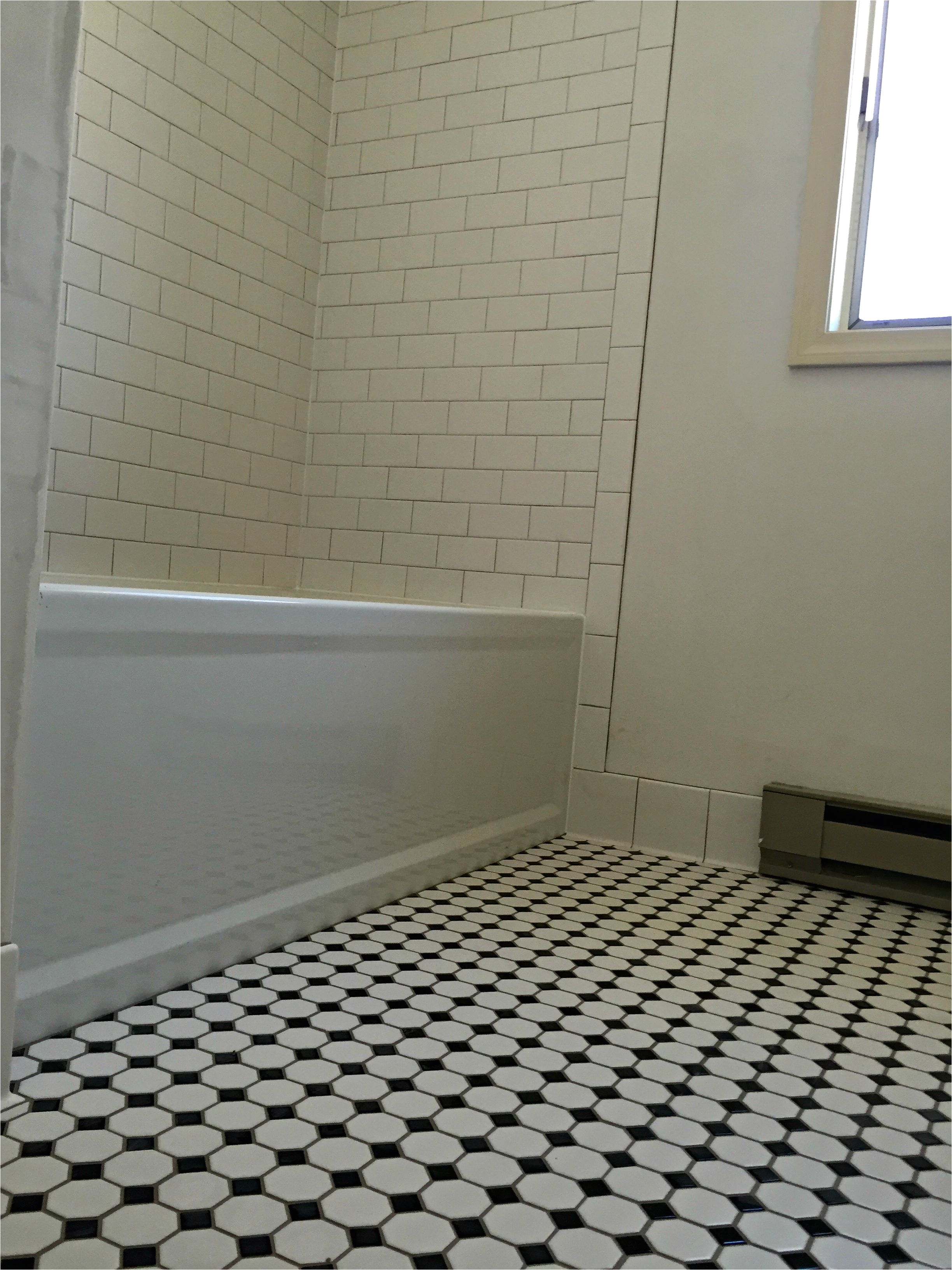 bathroom floor daltile octagon dot mosaic w black dot bath walls daltile rittenhouse square arctic white matt 3x6 grout 17 marble beige