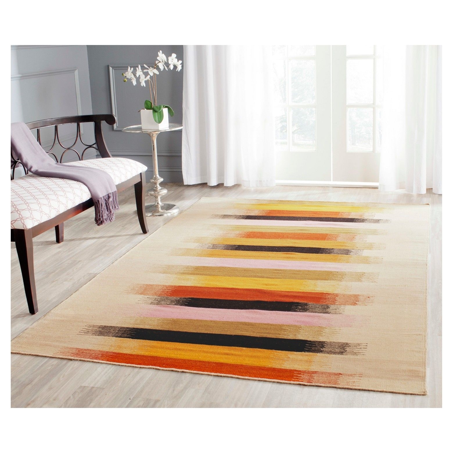 transform your room s look with a safavieh laila dhurrie rug boasting vibrant streaks of color this striking accent rug makes an excellent centerpiece in