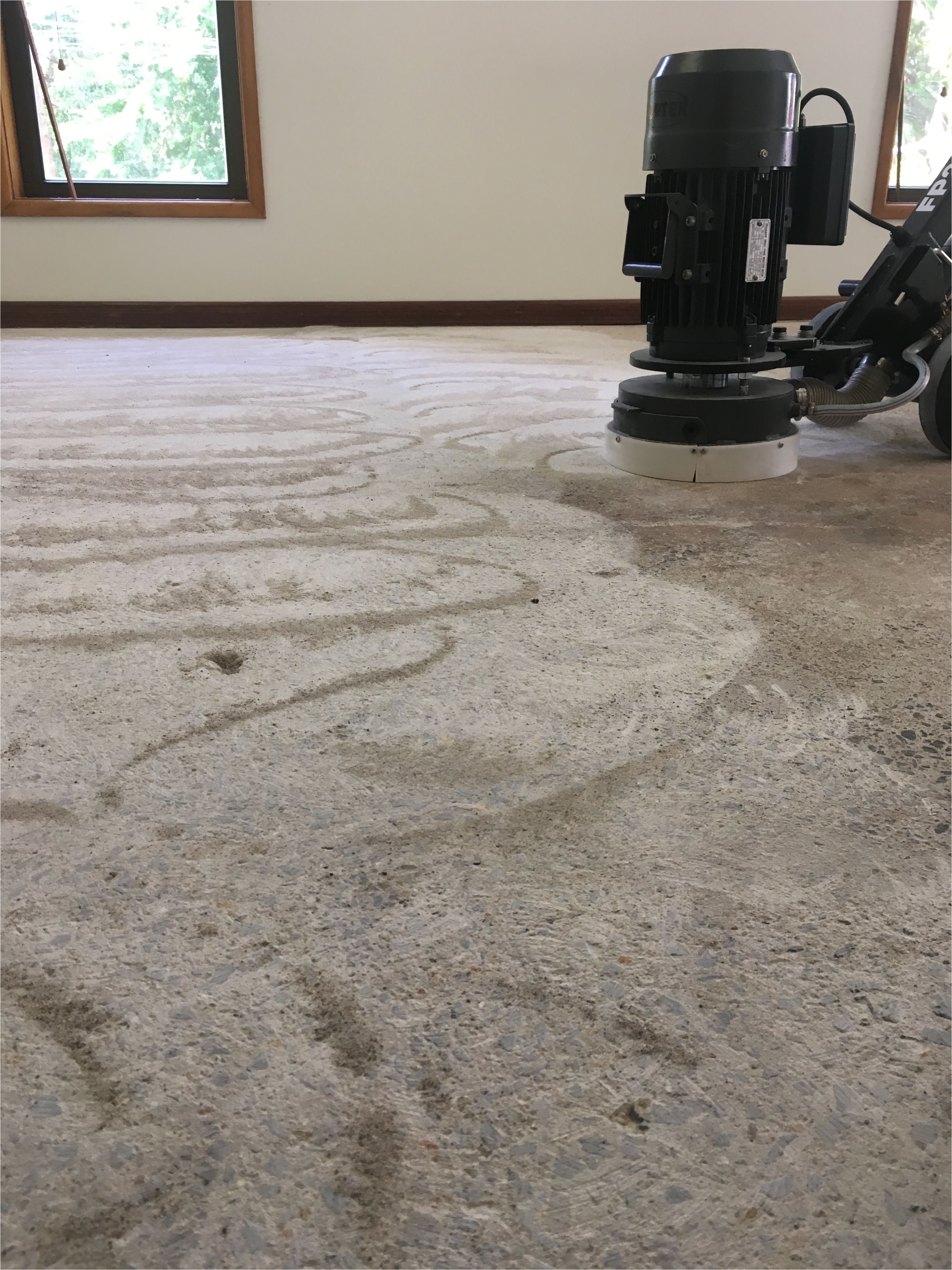 grinding the floor removes impurities and opens up the concrete s pores for the primer to adhere