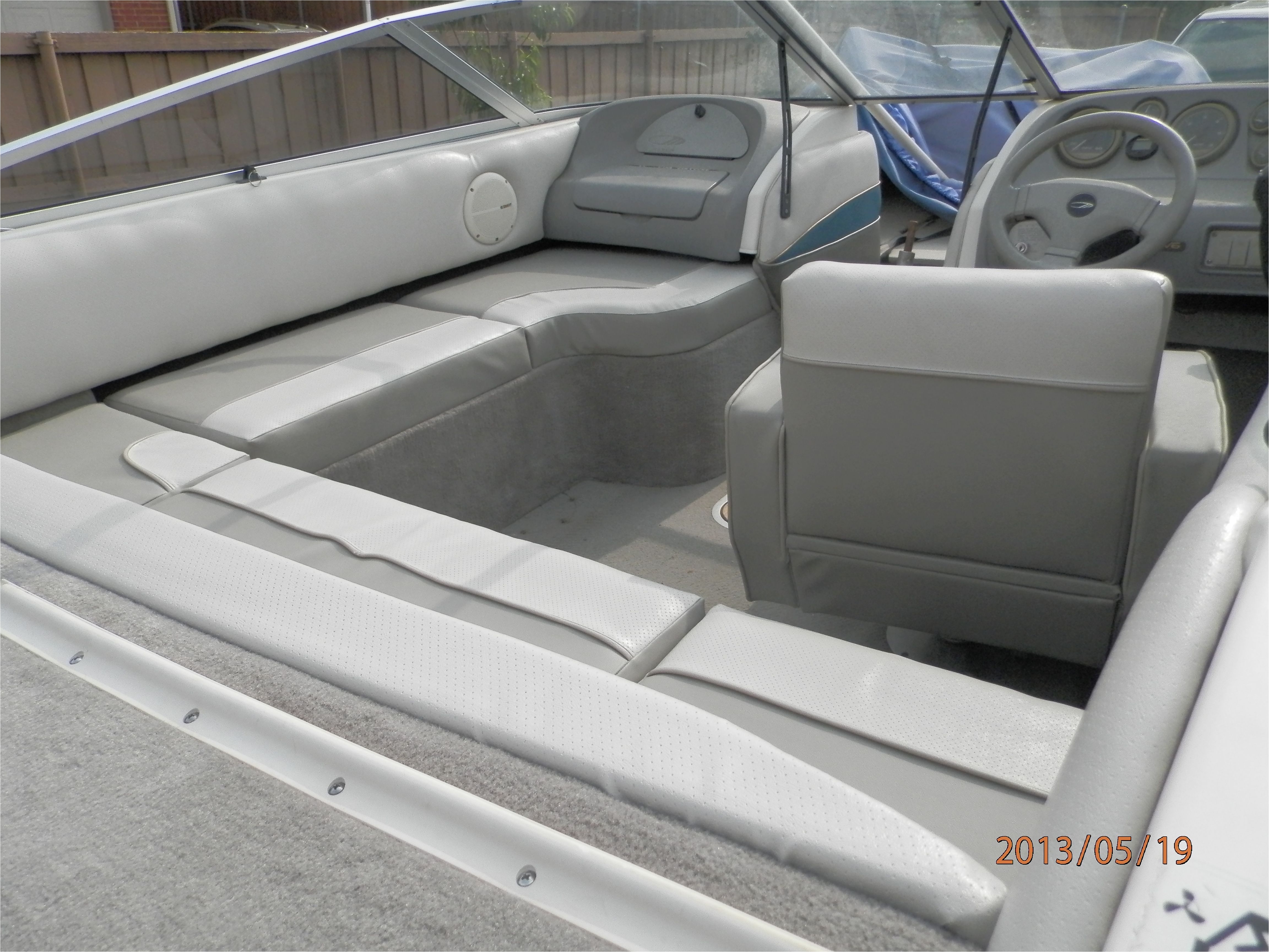 redesigned the old 1995 boat from 2 seats and a bench to wrap around seating with