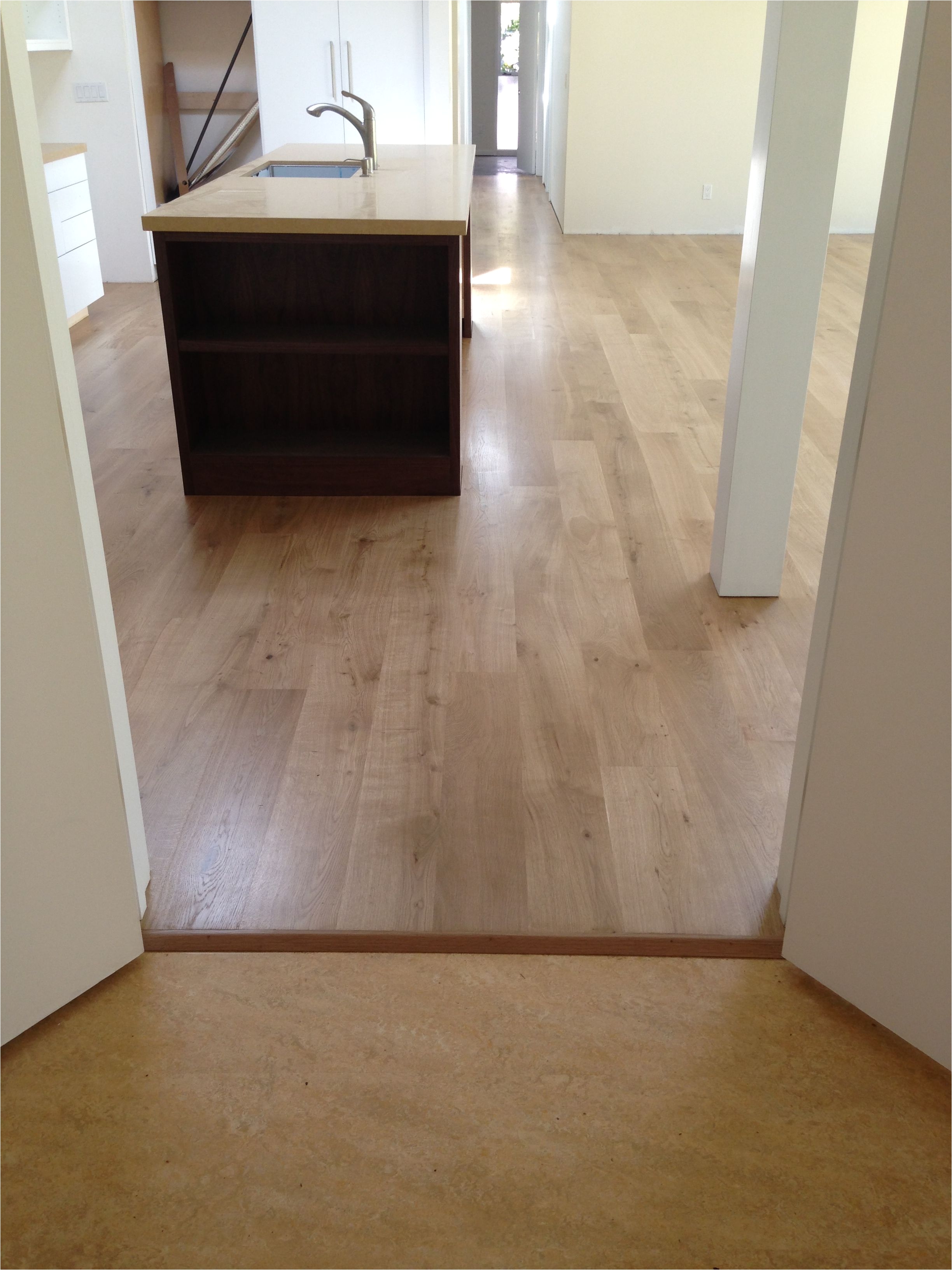 marmoleum cork budding french white oak sanded and finished with 3 coats of bona mega stain