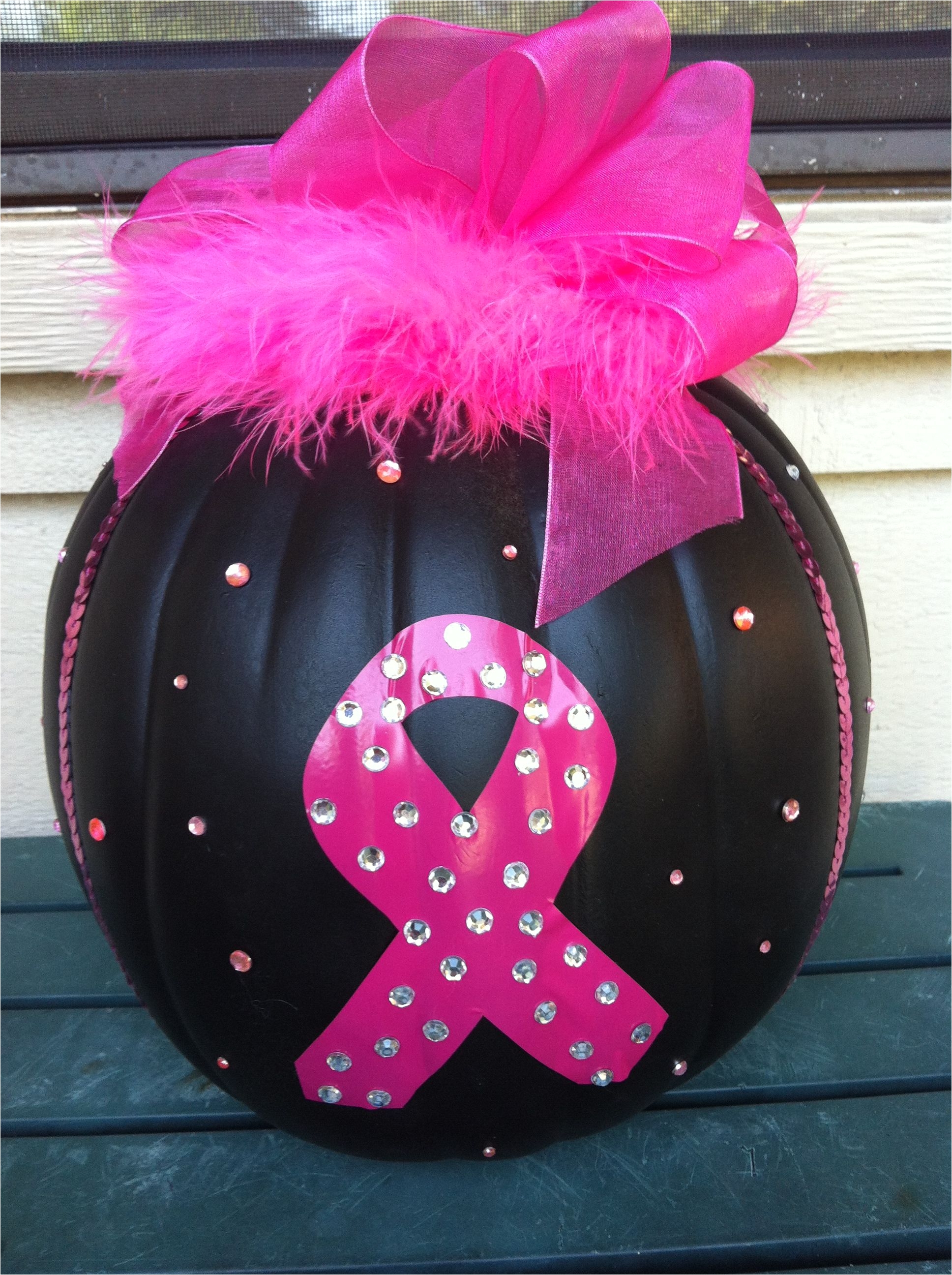 black pink ribbon pumpkin to support breast cancer awareness month