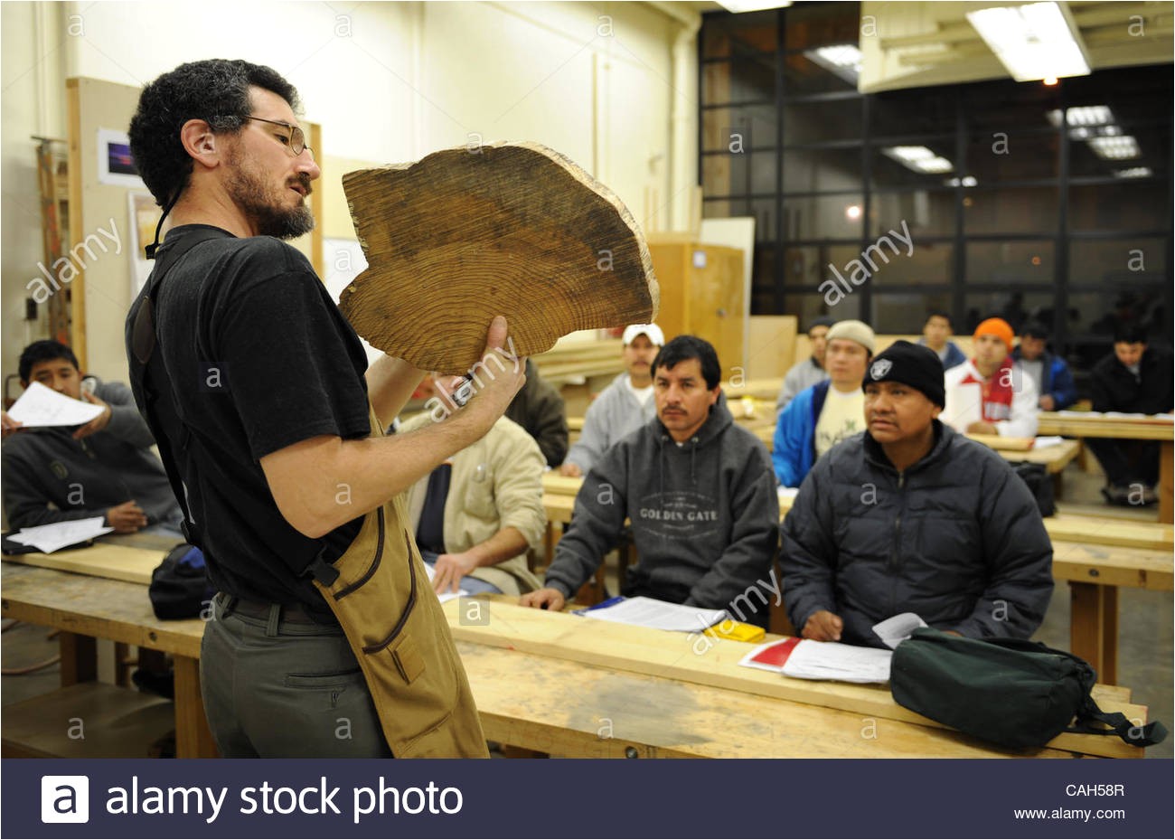 john mccormack teaches a bilingual cabinet making class at laney college january 9 2008 that targets spanish speakers many of whom already work day jobs