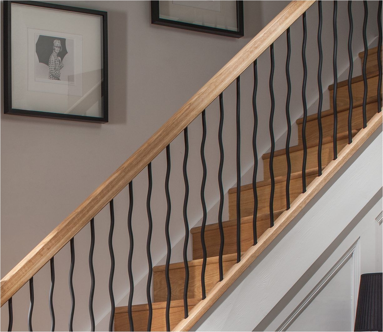 contemporary iron wavy spindles boast a beautiful contemporary design and can easily be teamed with handrails