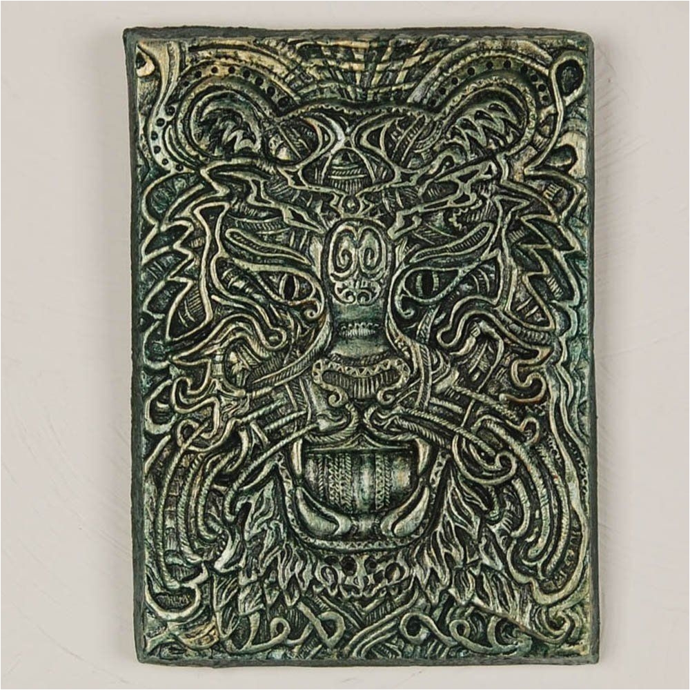 celtic tiger handmade decorative garden art cast stone wall plaque this striking tiger face is deeply carved with multiple layers of celtic knots and