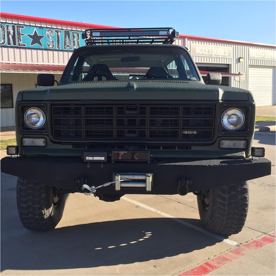 1978 blazer with custom bumpers rigid ir led lights and hyperspots custom roof rack racing fuel cell and custom sprayed in od green w black accents