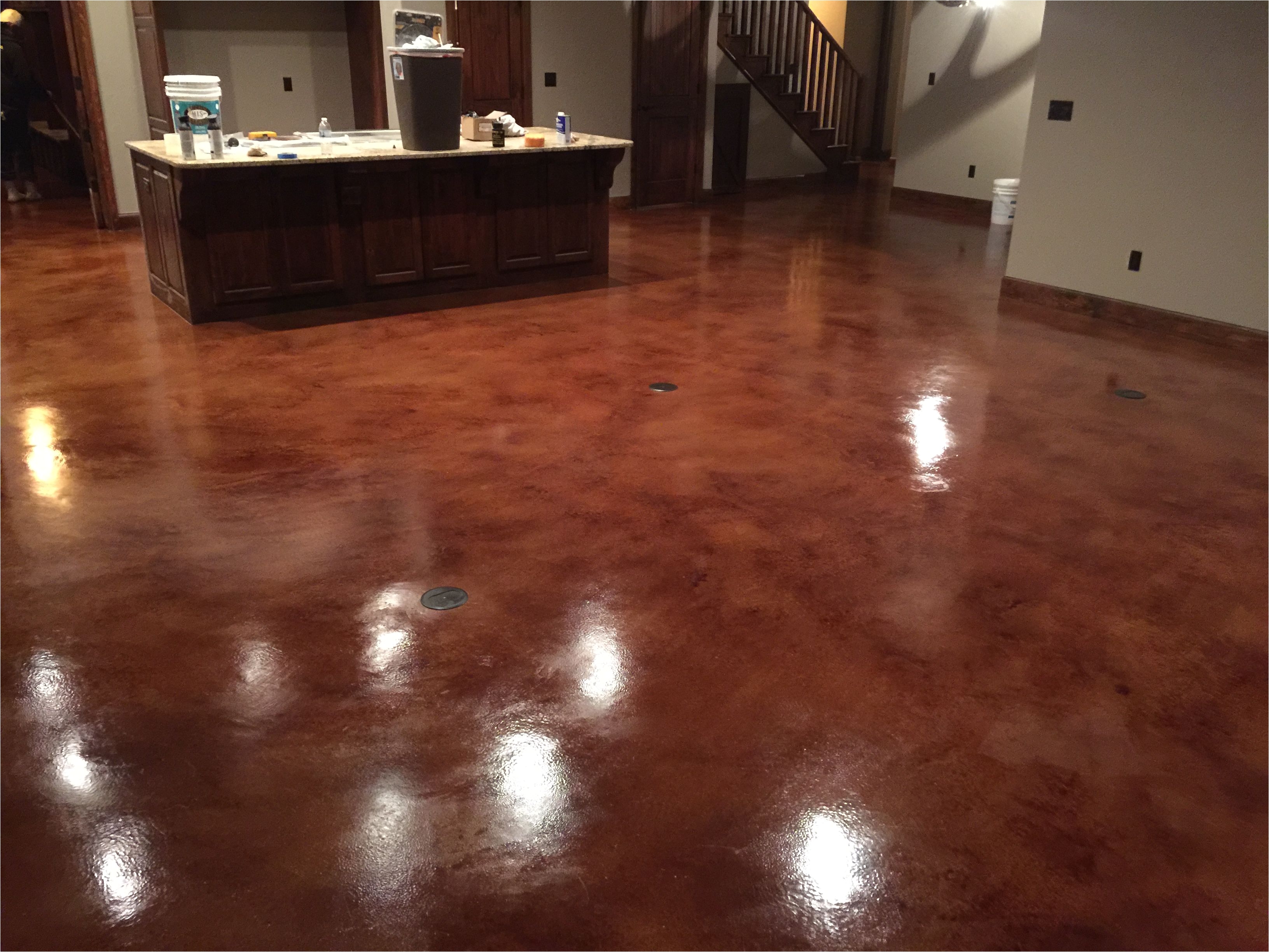 resurfaced concrete with english red stain and acrylic sealer and synthetic wax coat 2