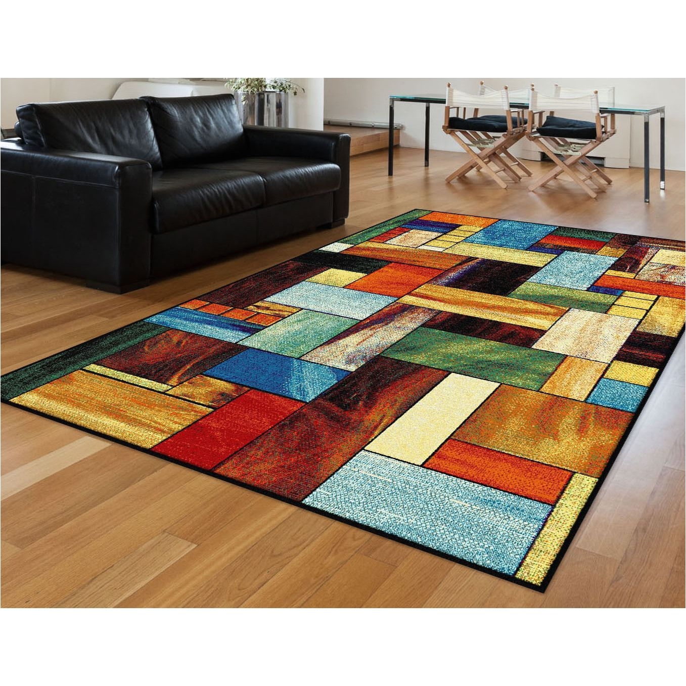 adore your decor with this colorful contemporary area rug that evokes the idea of stained glass the earnest abstract arrangement combines hues to form an