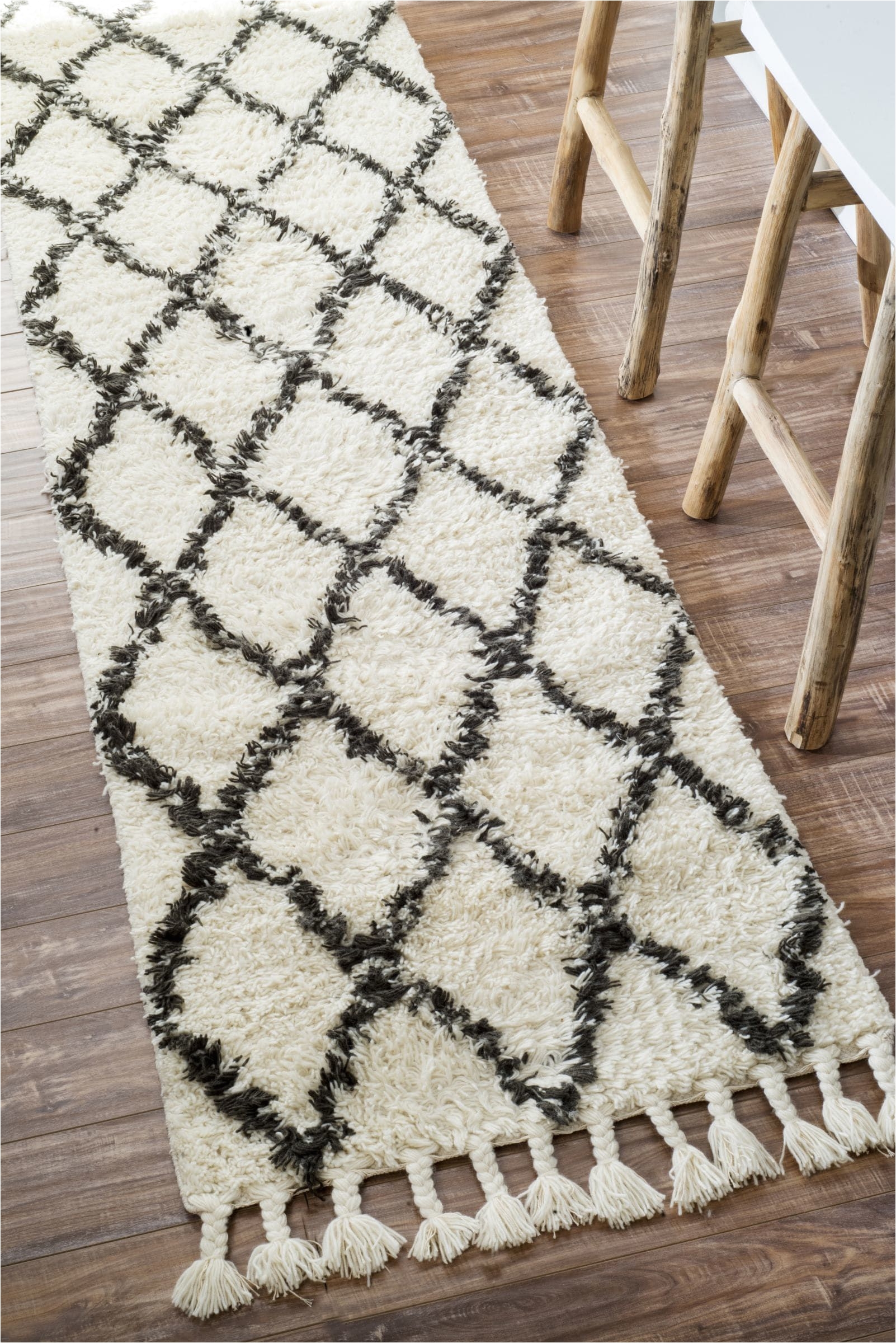 the plush hand knotted 100 woolen rug is a welcome cushion to your tired feet the rug features a dense pile and comes in various sizes and three colors