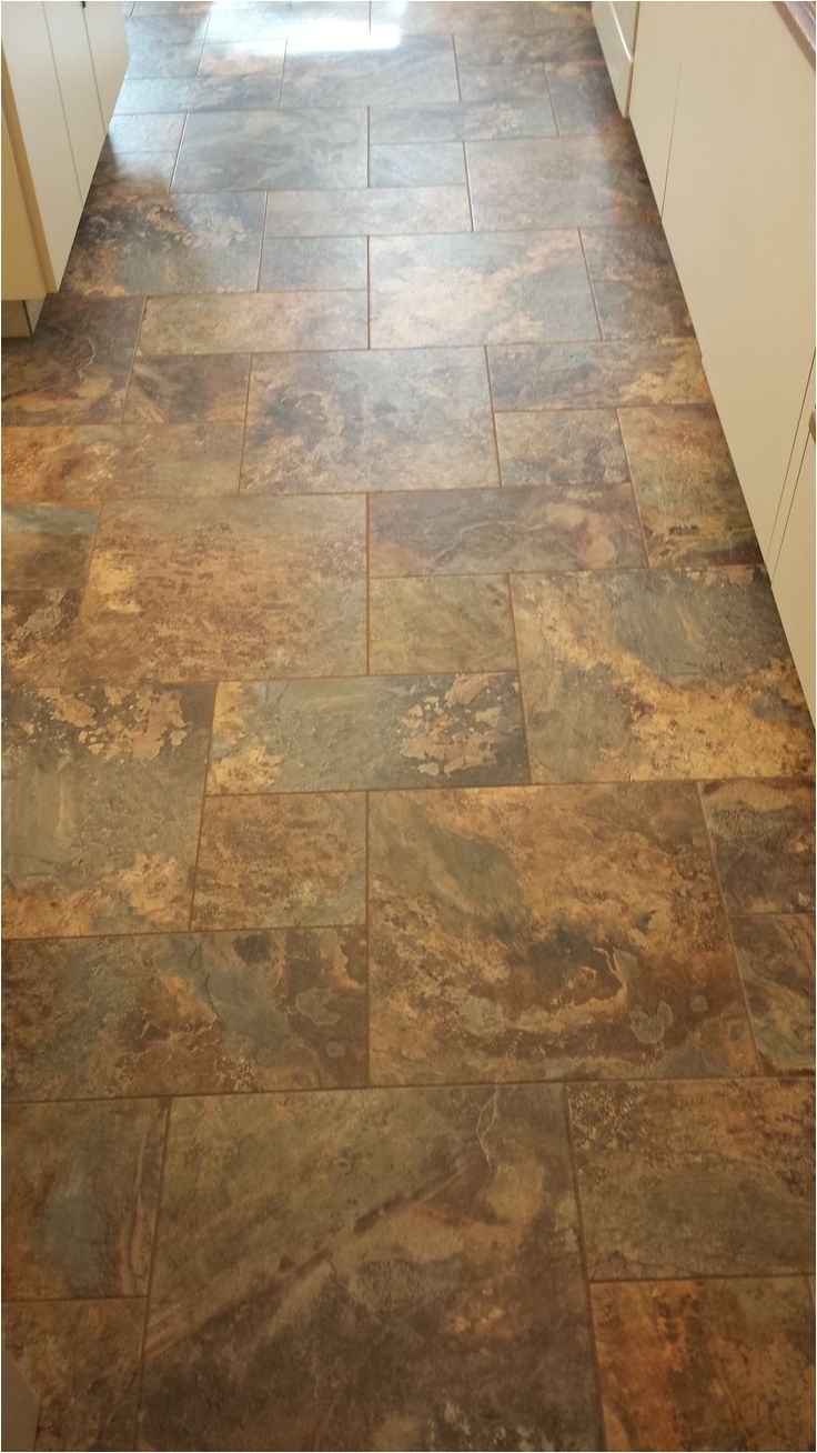 this is a modular vinyl tile from armstrong alterna the cobblestone pattern used 3 sizes