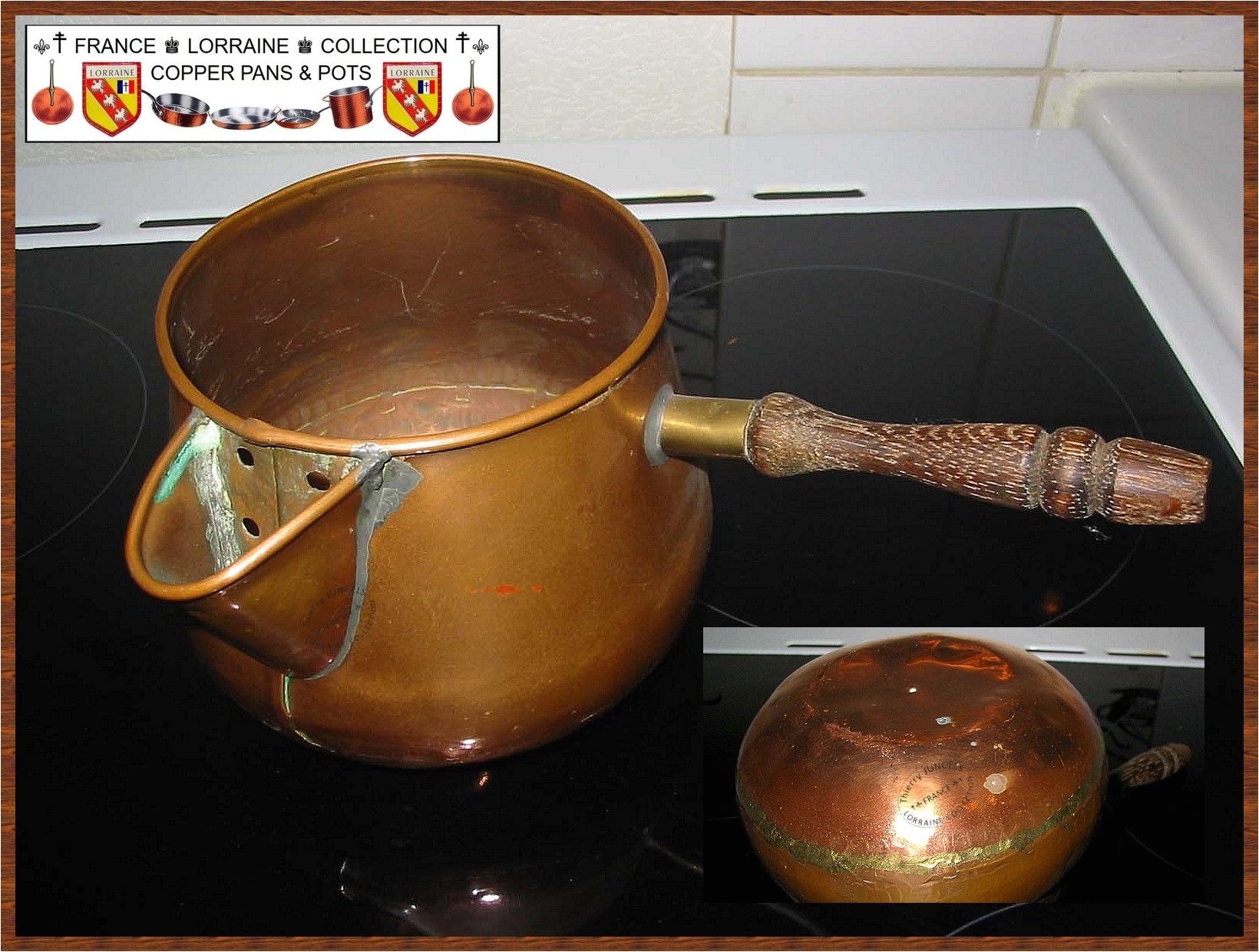 nice old copper pot with wood handle