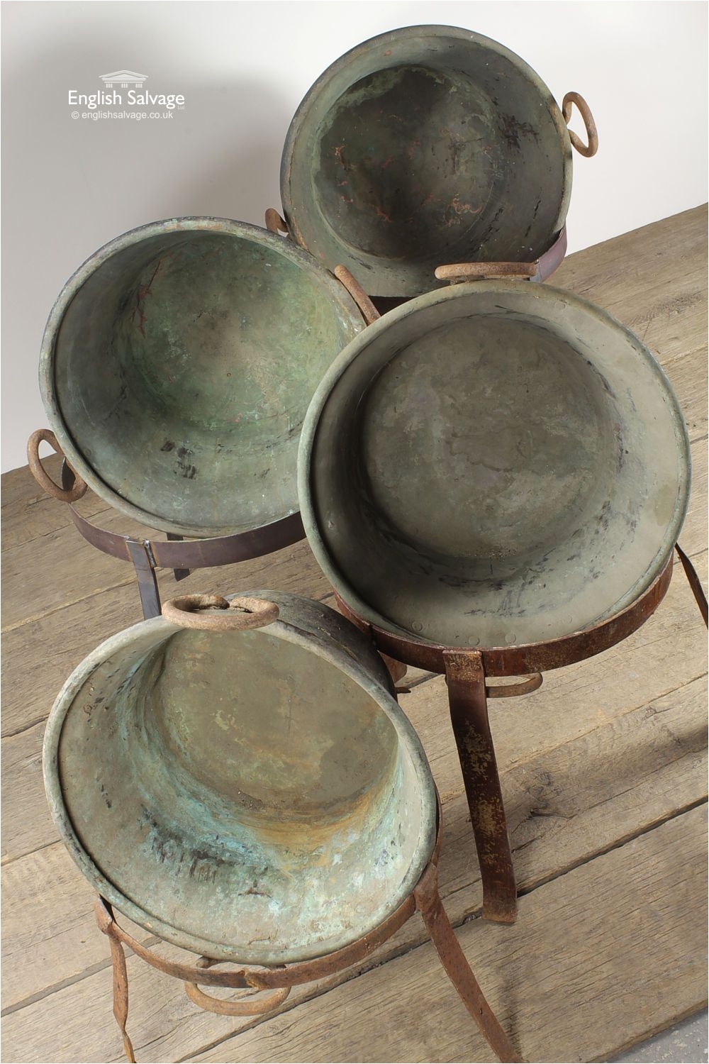 reclaimed vintage copper pots on stands
