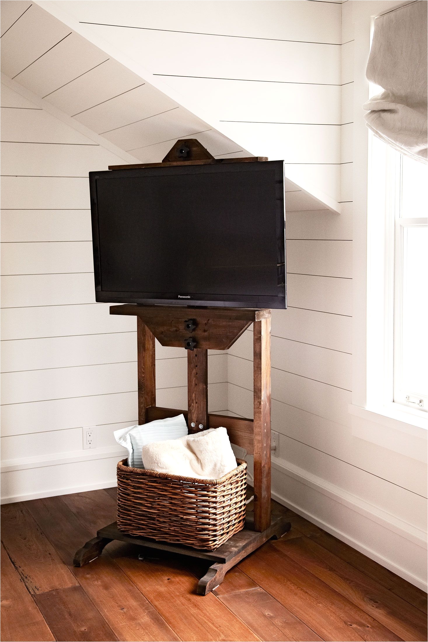tv easel stand in corner hidden tv cables with restoration hardware easel and wicker basket