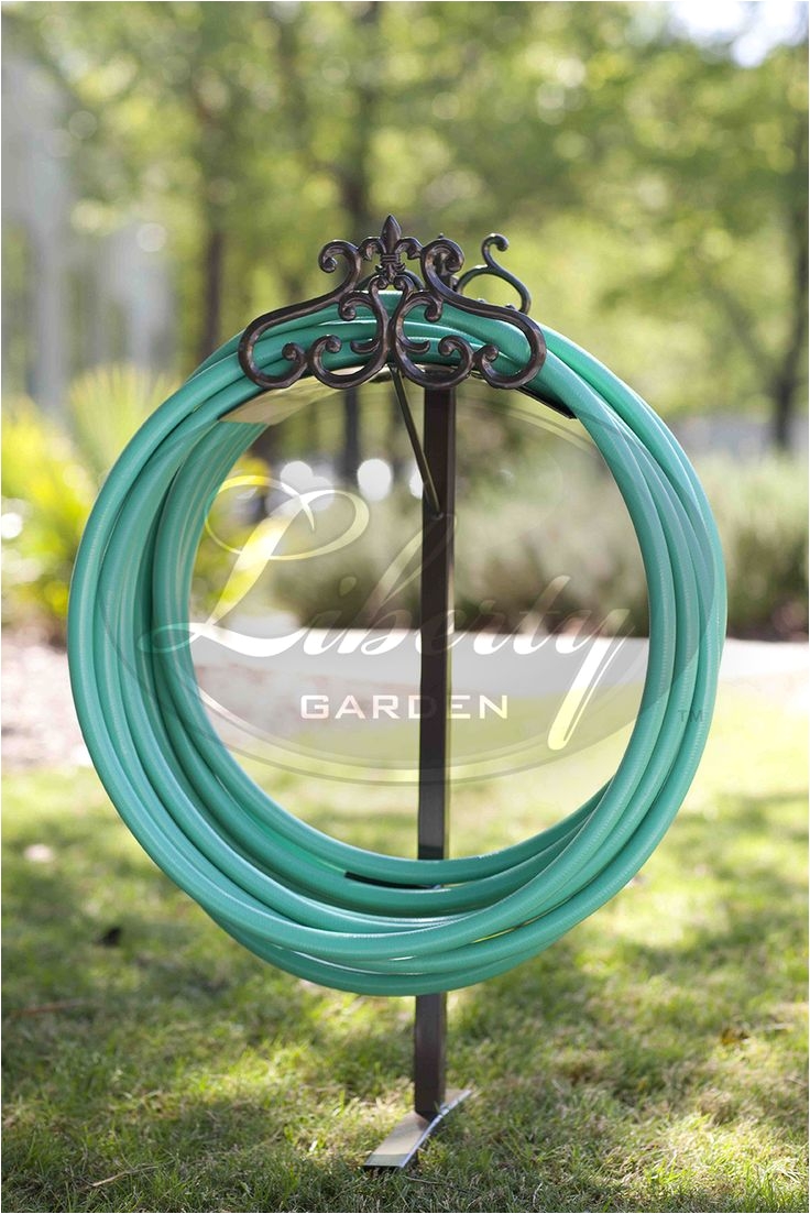 the hyde park decorative hose stand compliments any lawn with it s mediterranean inspired design