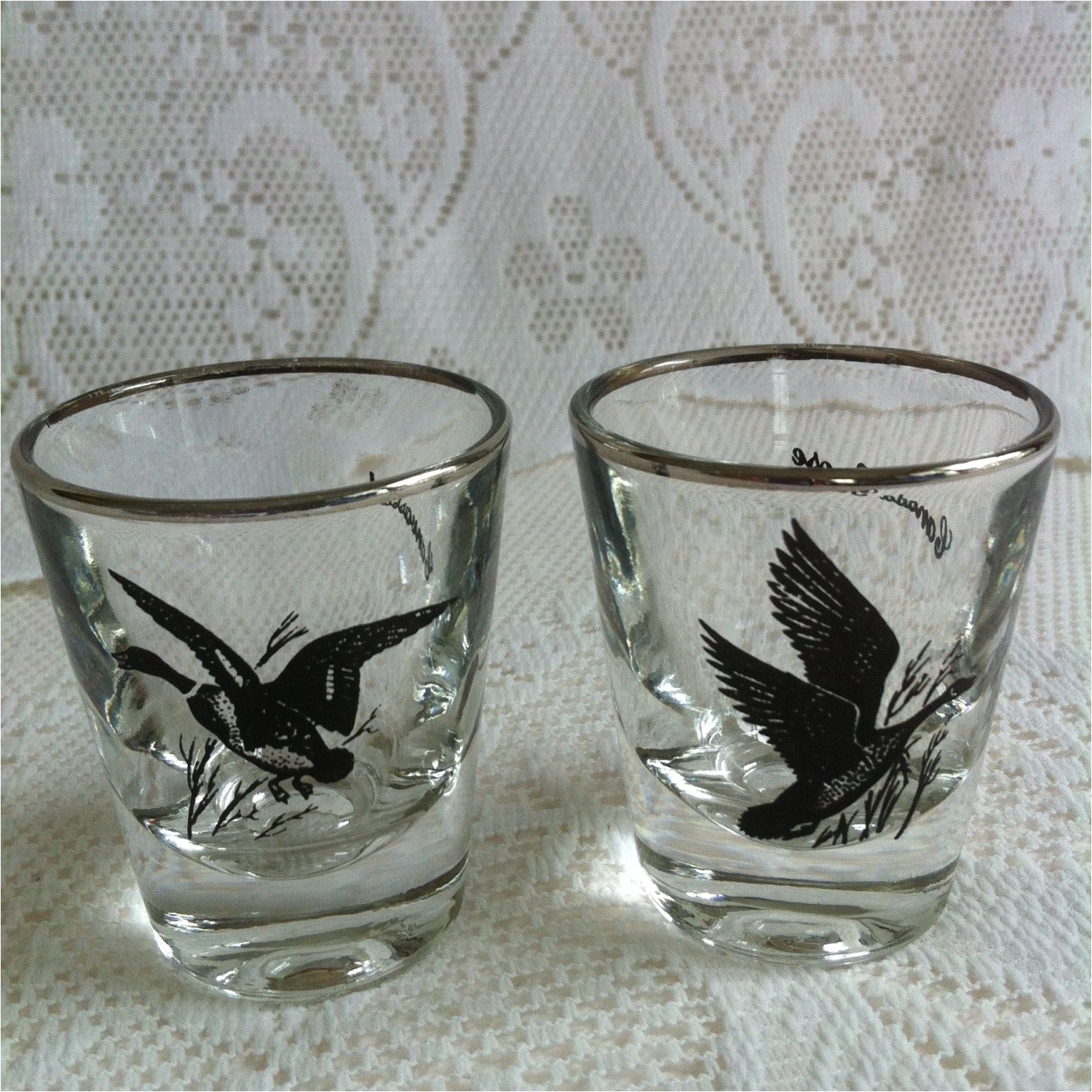 vintage silver rimmed pair of shot glasses handpainted canvasback duck canada goose pinned by pin4etsy com