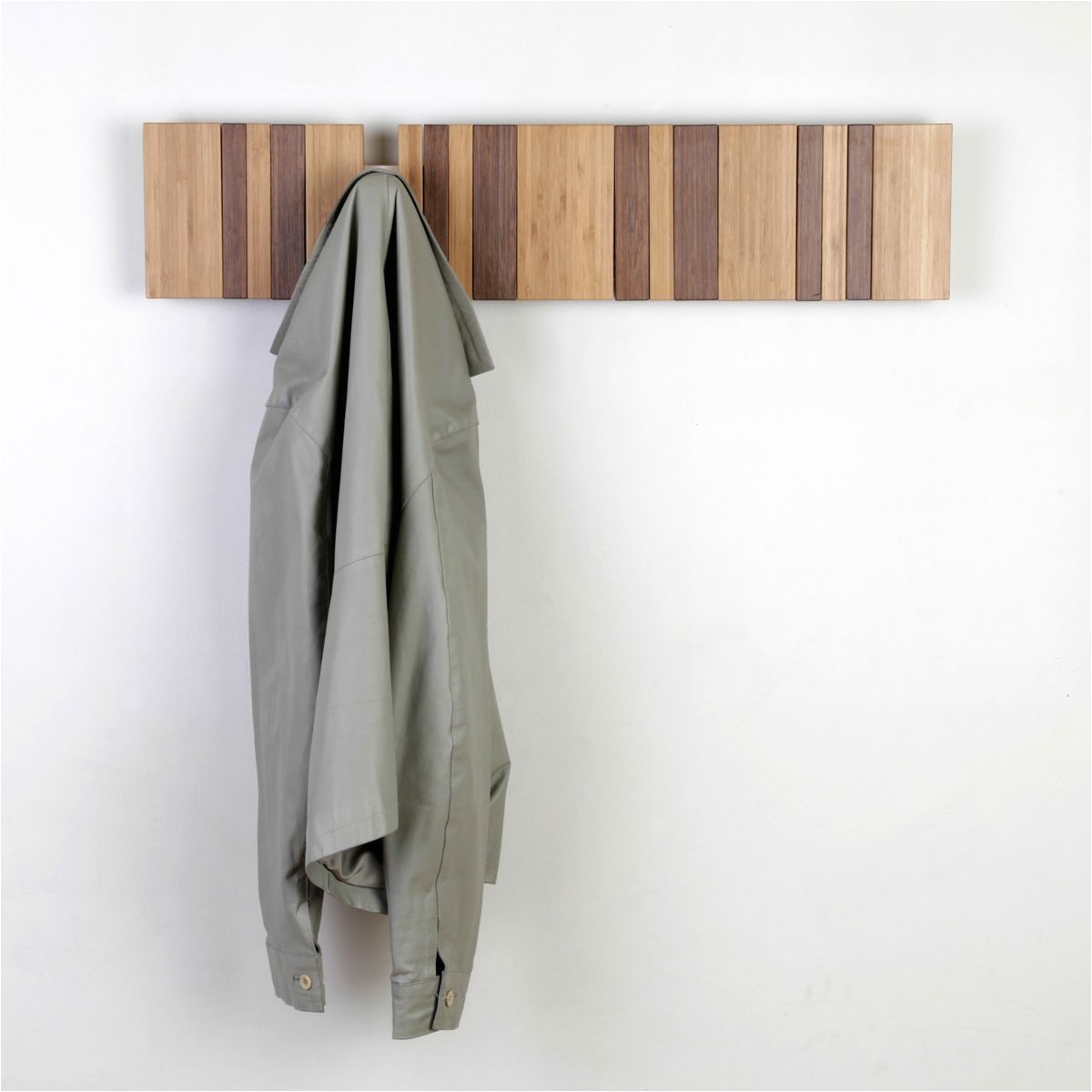 a piece of art or a cool coat rack the dark slats pull