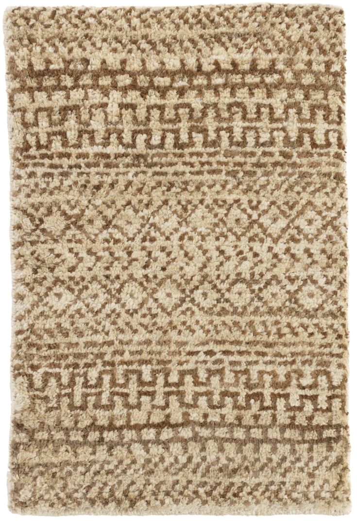 rugged texture of classic moroccan weave hand woven jute rug with stripes of geometric patterns that