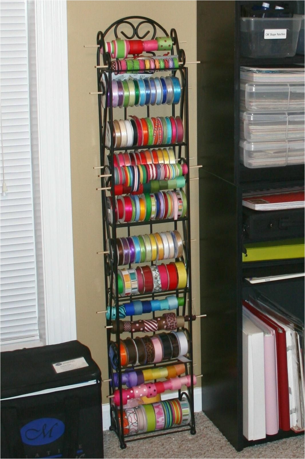 i soo need to do something like this with all my ribbon using a wine rack for ribbon storage