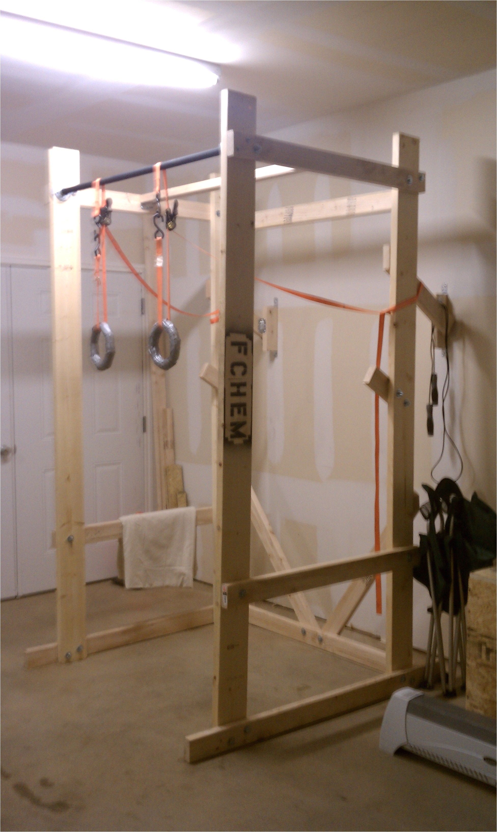 build your own power rack this guy has some crazy diy ideas for the garage gym