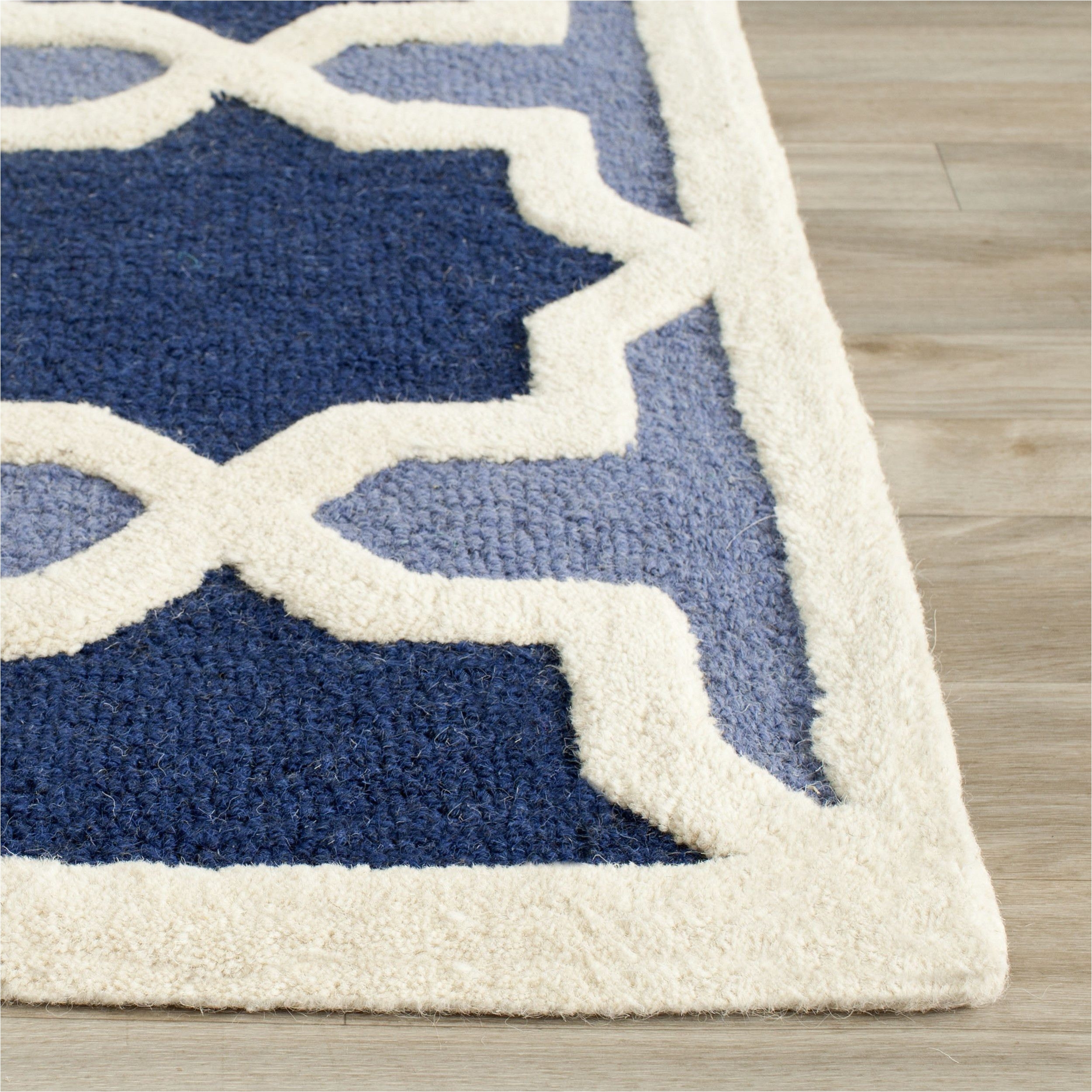 martins dark blue ivory area rug