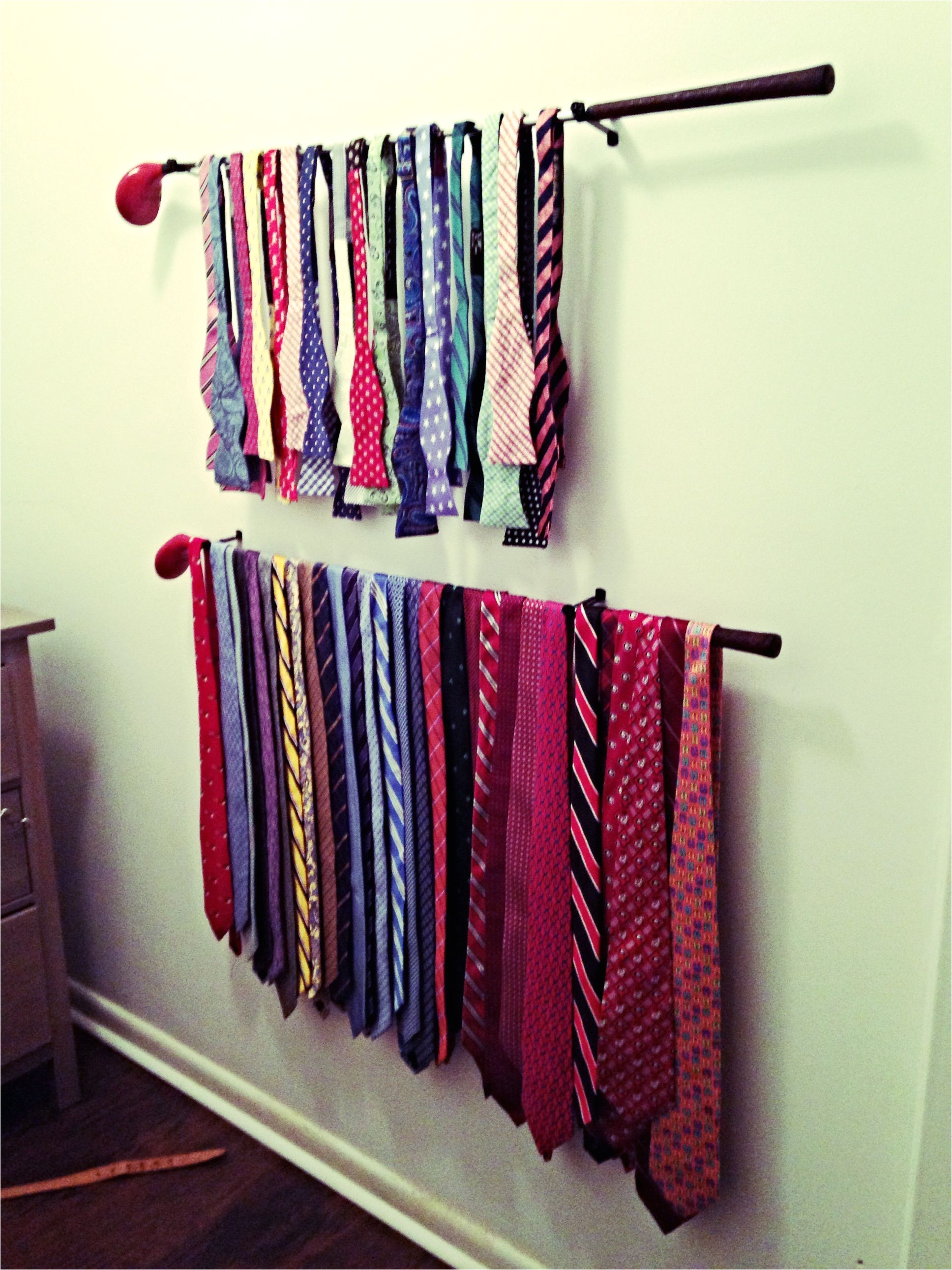 jared turned my grandfathers old wooden golf clubs into his new tie rack turned out awesome