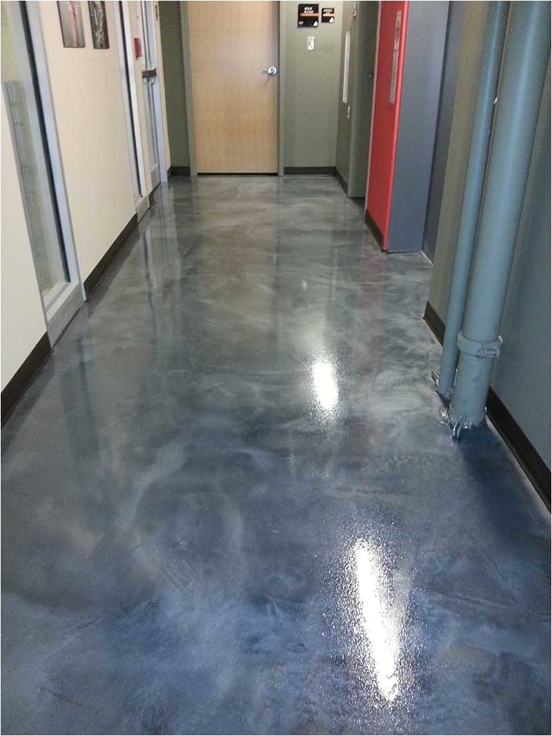 grinding the floor a gleaming epoxy finish