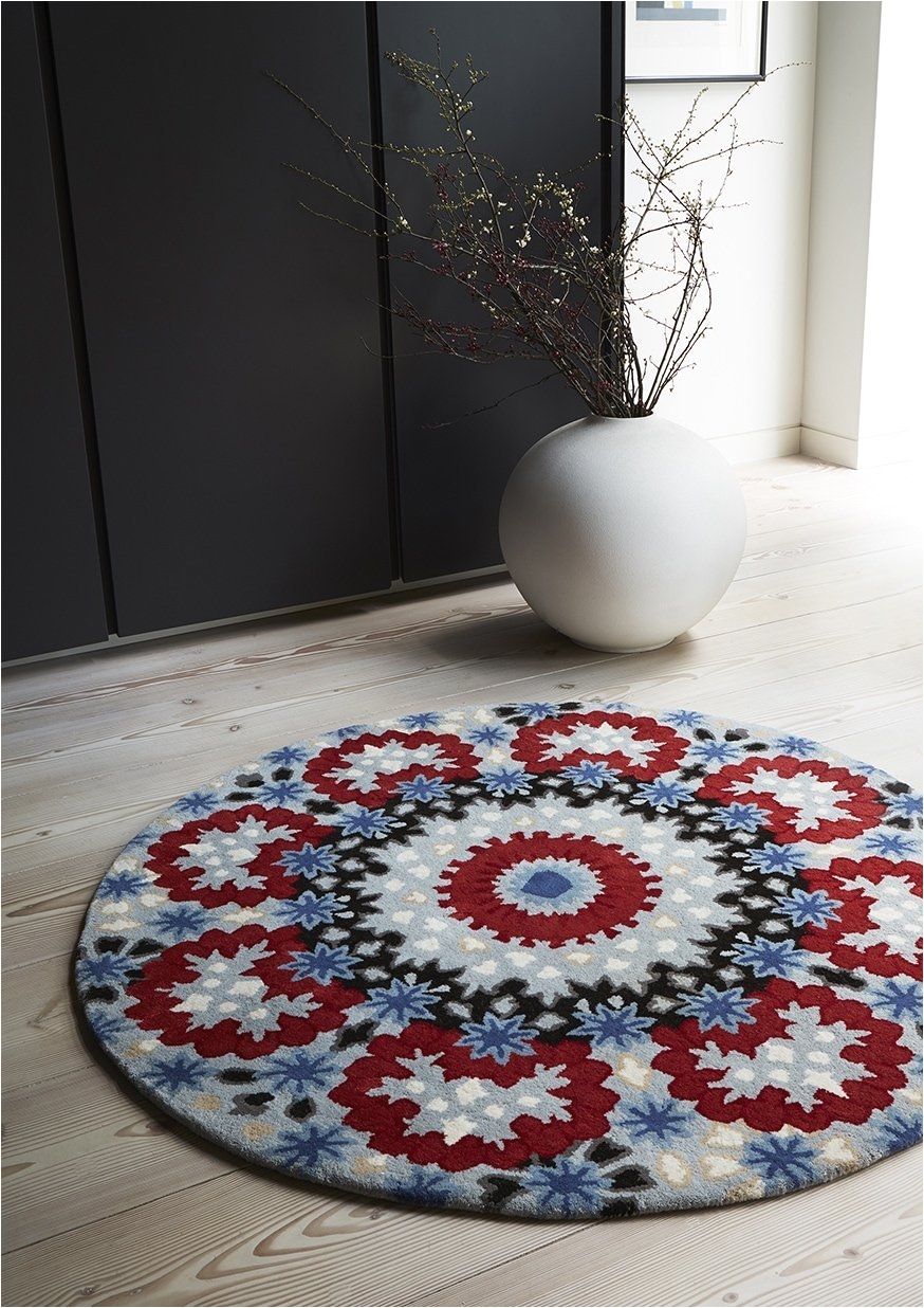 round nomad rugs blue red and grey