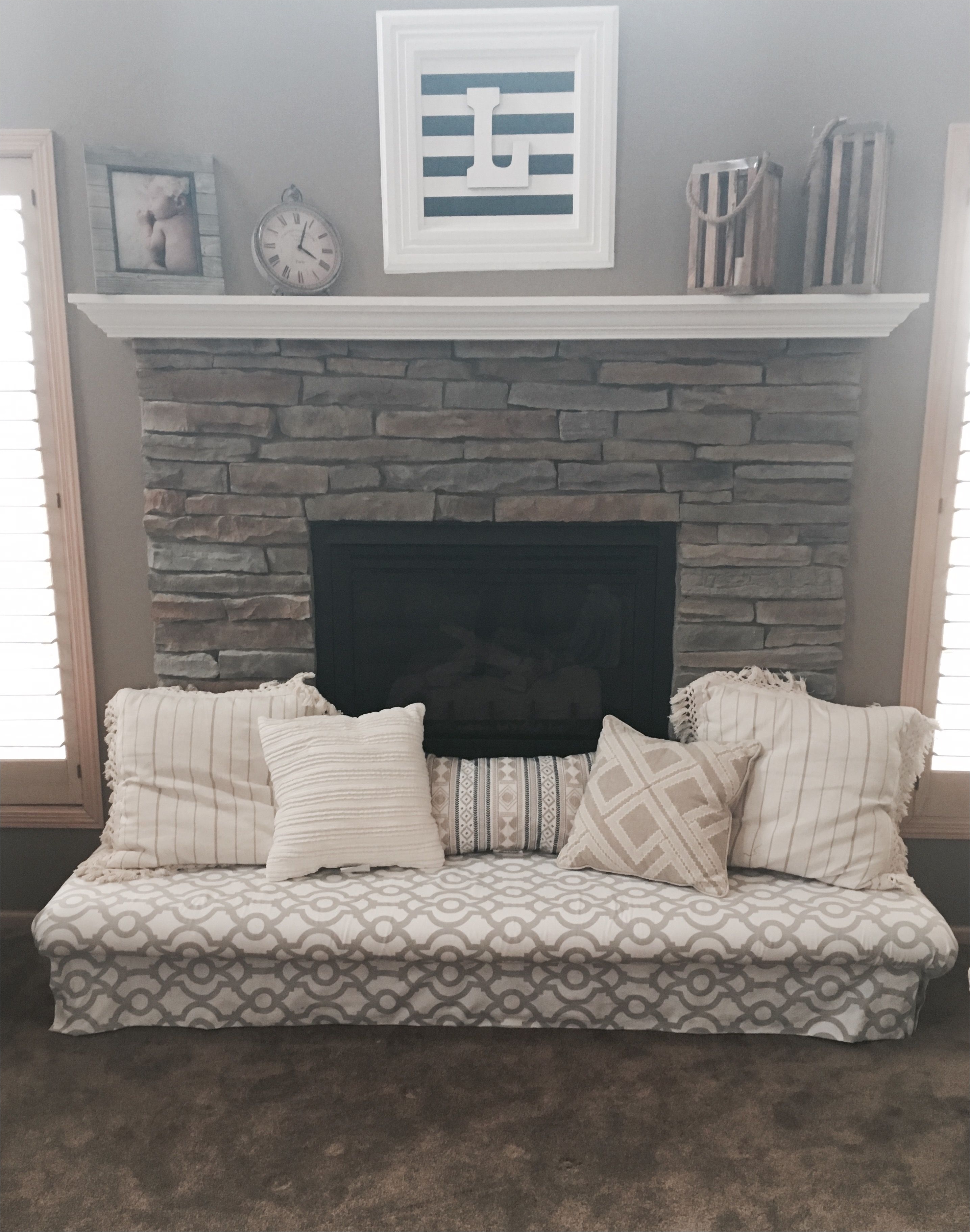 baby proof the fireplace hearth with a padded bench