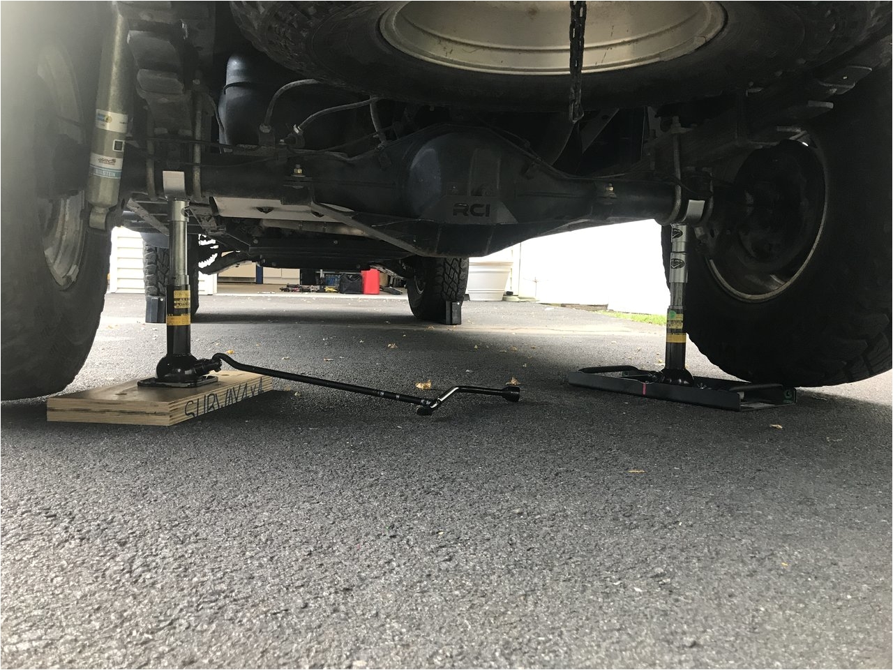 the mechanical jack doubles as a jack stand with the bases providing stability and flotation i feel much safer working under the truck