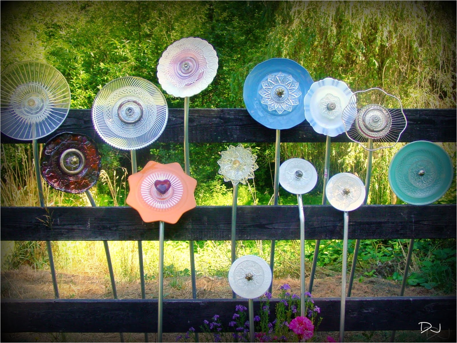 garden art from up cycled dishes