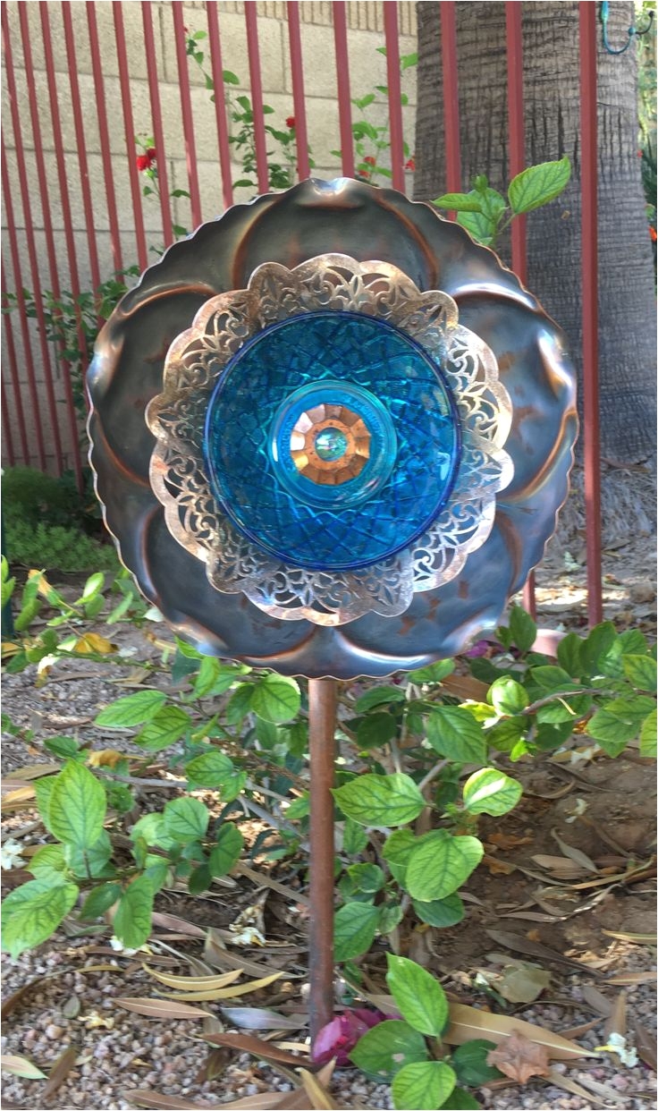 copper and blue glass garden art