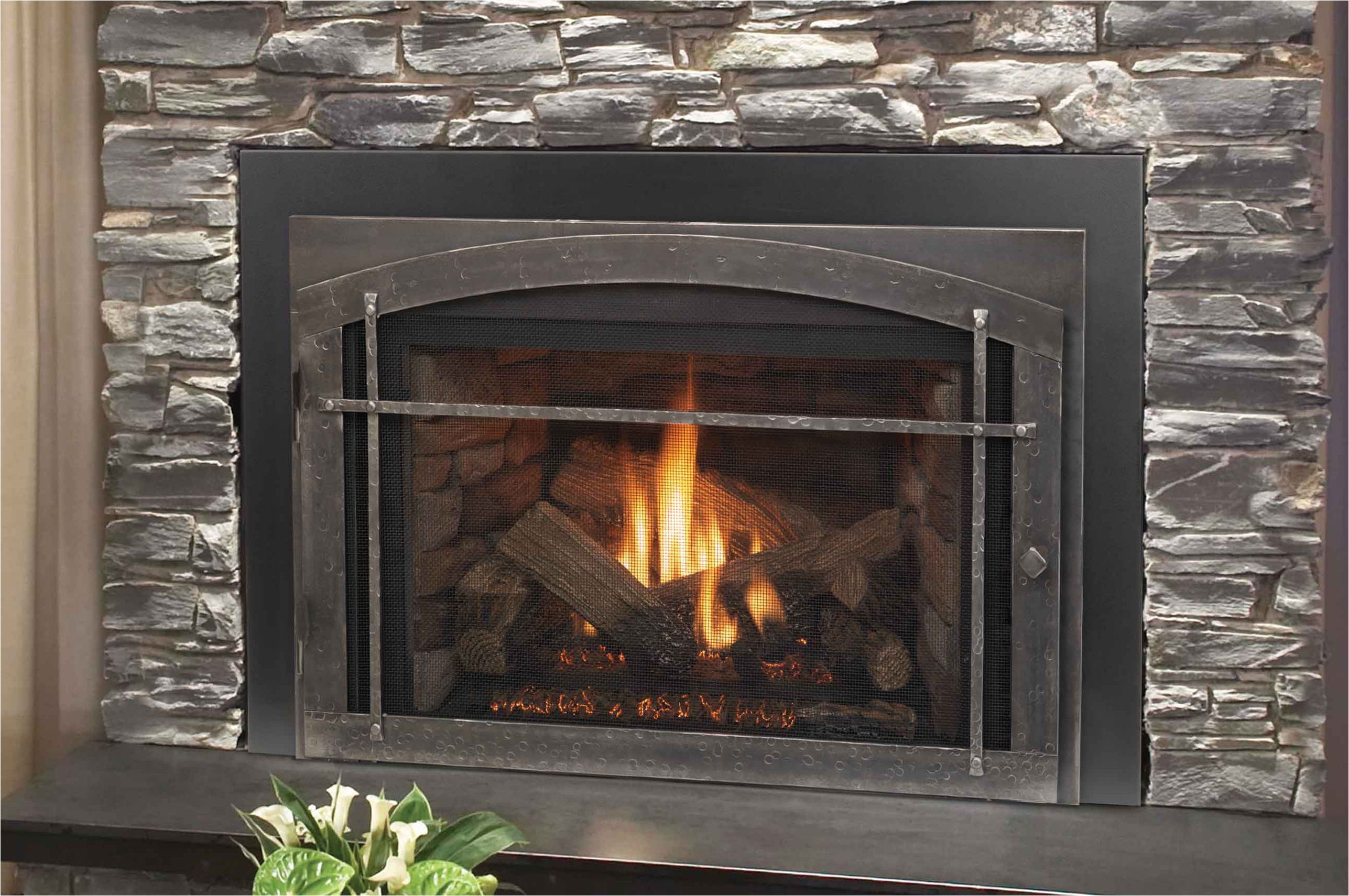 a gas fireplace requires pushing a button often on a remote fireplace ventilation is very important to maintain the integrity of your gas unit