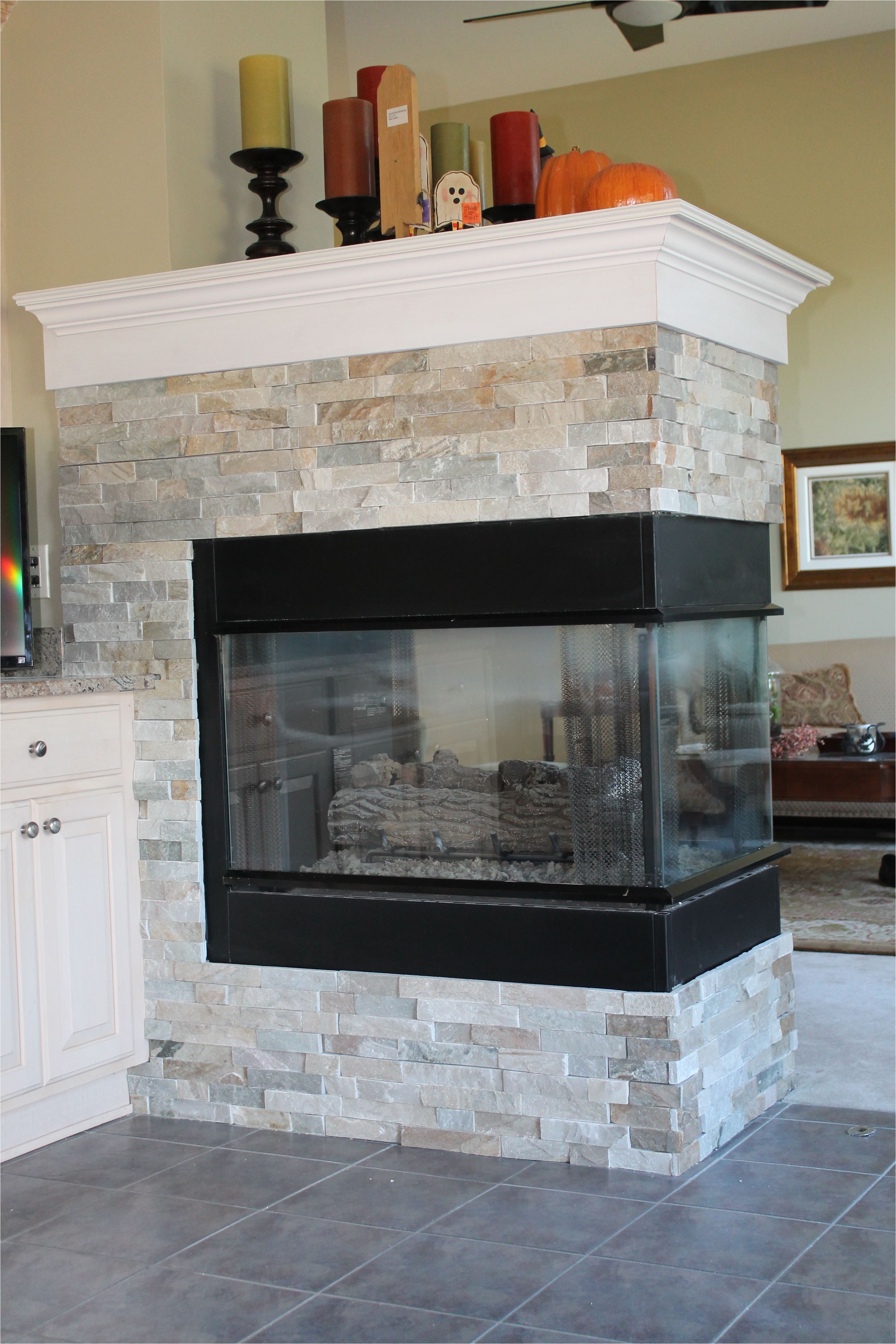 new gas fireplace with custom slate surround