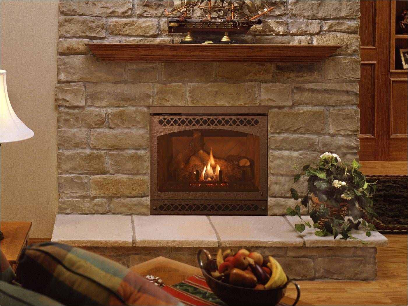 quadra fire qv32a gas fireplace i like this one it s expensive but i like the flush look would have a mantle instead of stone work for the gas stove