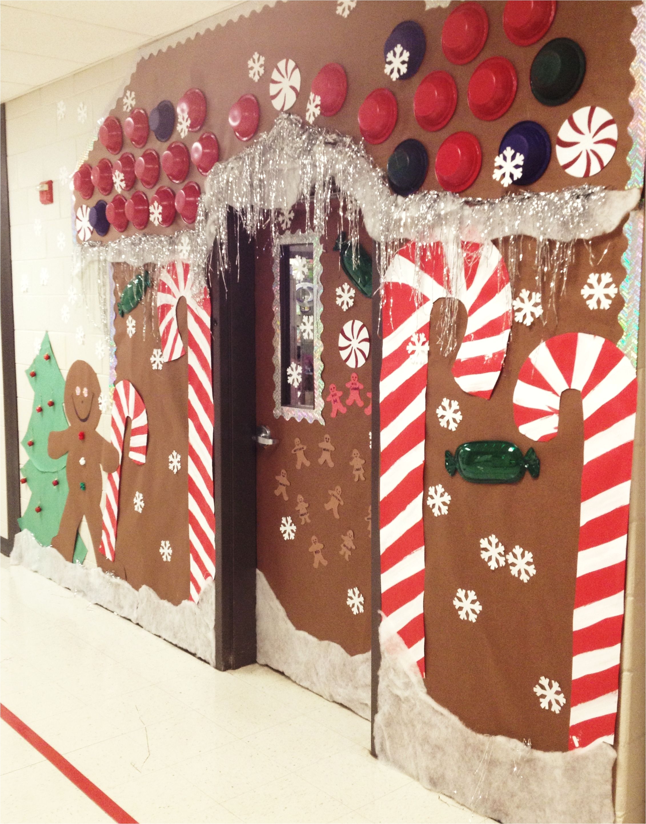 christmas holiday door decoration for school gingerbread house door i spent about 12 on this door decor school provided paper but took about 5 hours