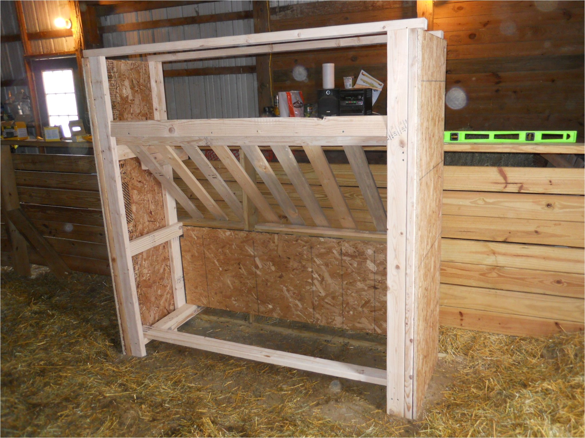 homemade hay rack i would put the tray up higher