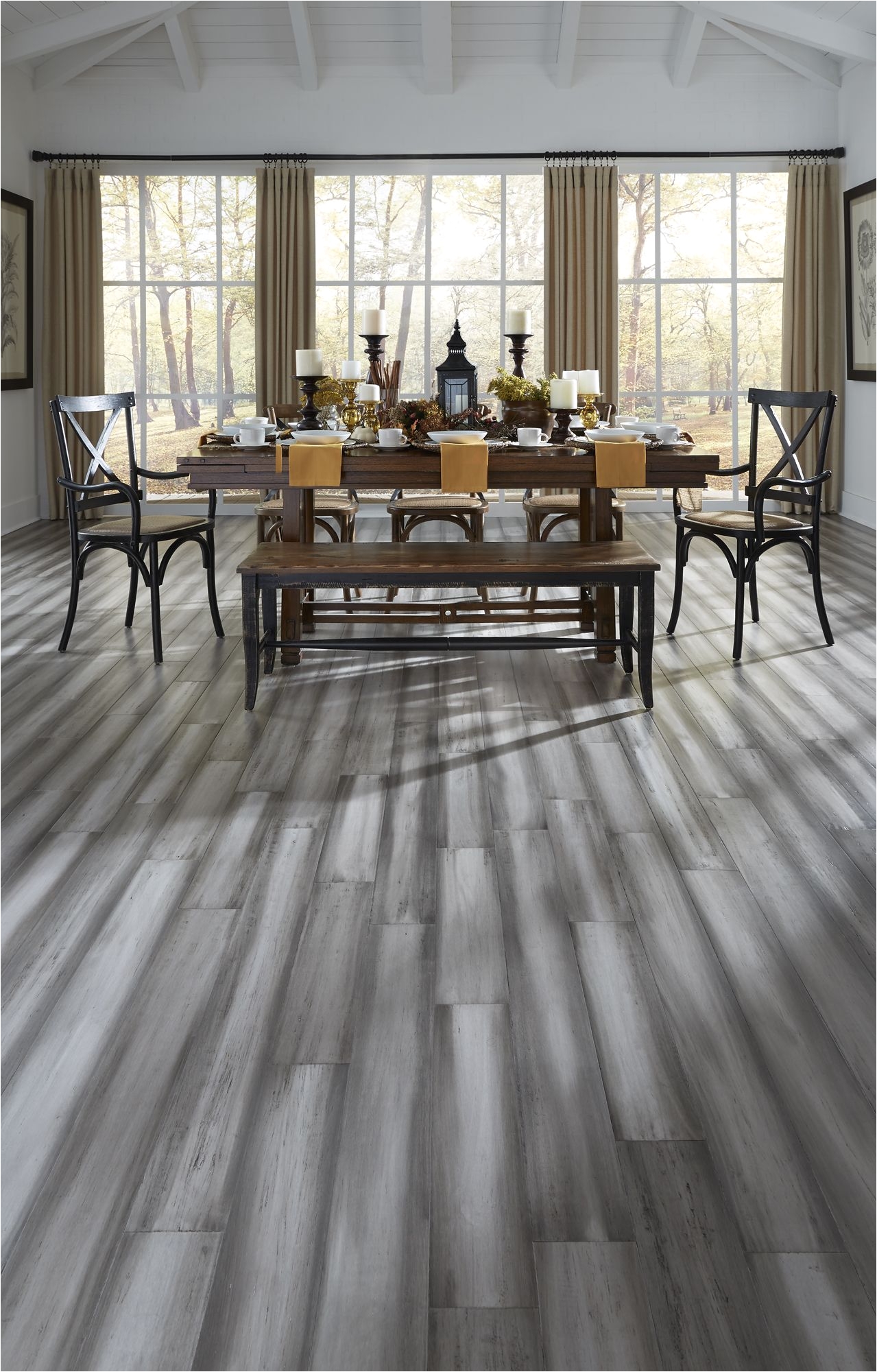 blend of light and dark gray shades to offer instant charm in silver stone distressed bamboo this hand painted floor features a two pass staining