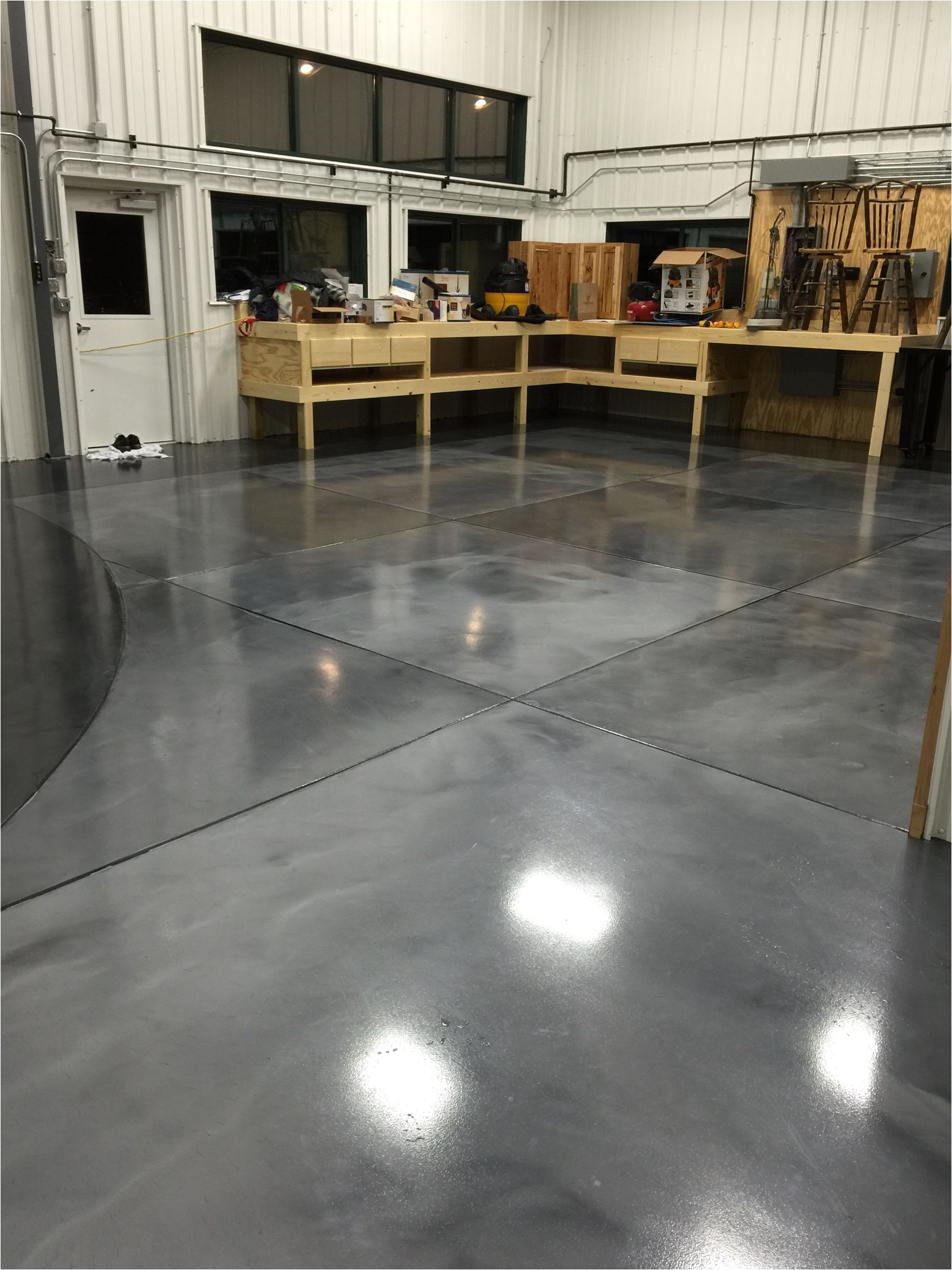 metallic epoxy floor coatings with epoxy grout lines by sierra concrete arts