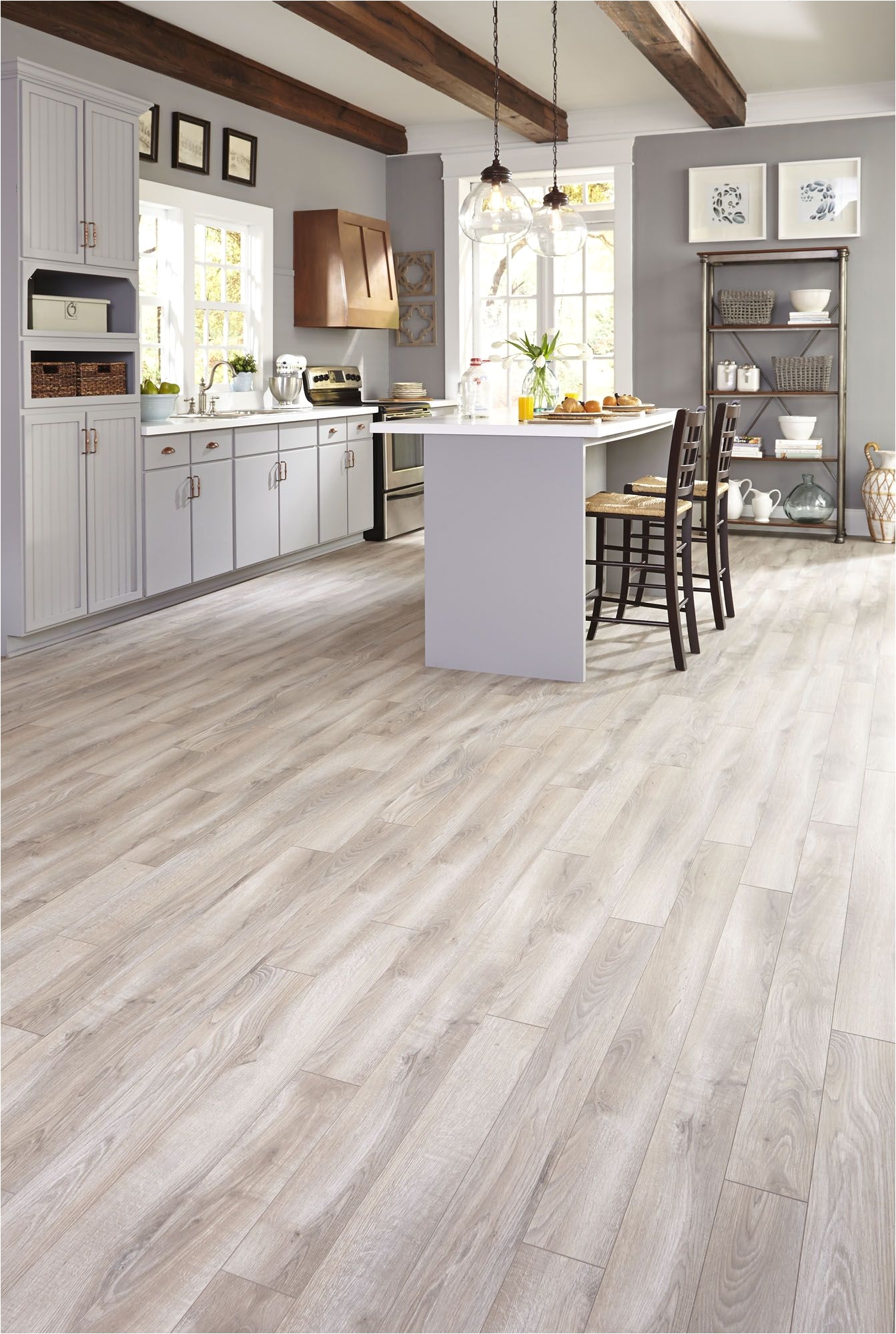 gray tones mixed with light creams and tans suggest a floor worn over time evoking a classic yet contemporary style check out this featured style