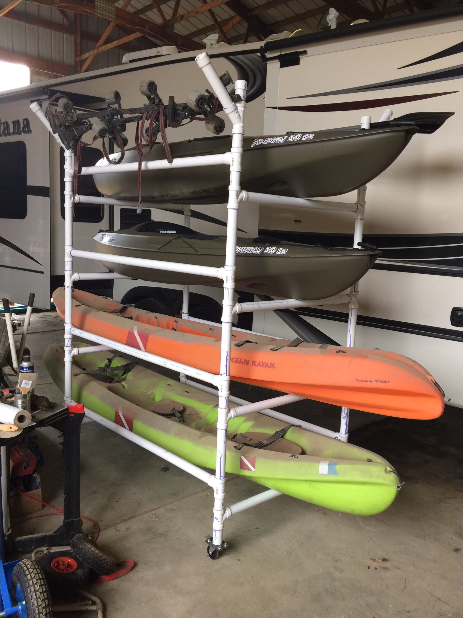 homemade pvc kayak rack can store 4 kayaks paddles kayak car rack made from 1 5 schedule 40 pvc 40 wide x 5 long cost around 250 in 2015 prices has