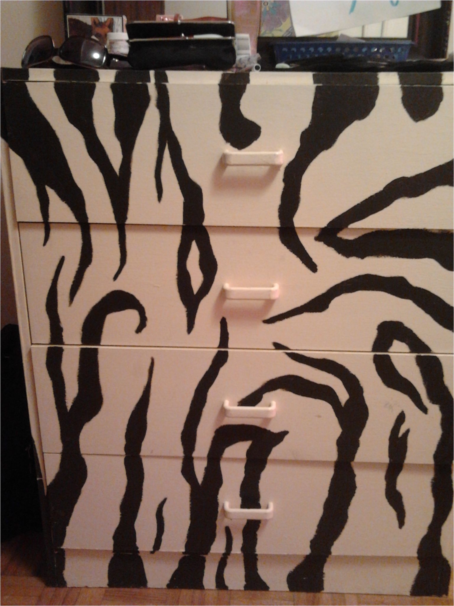 this is my diy zebra print dresser which only cost about 20 to make