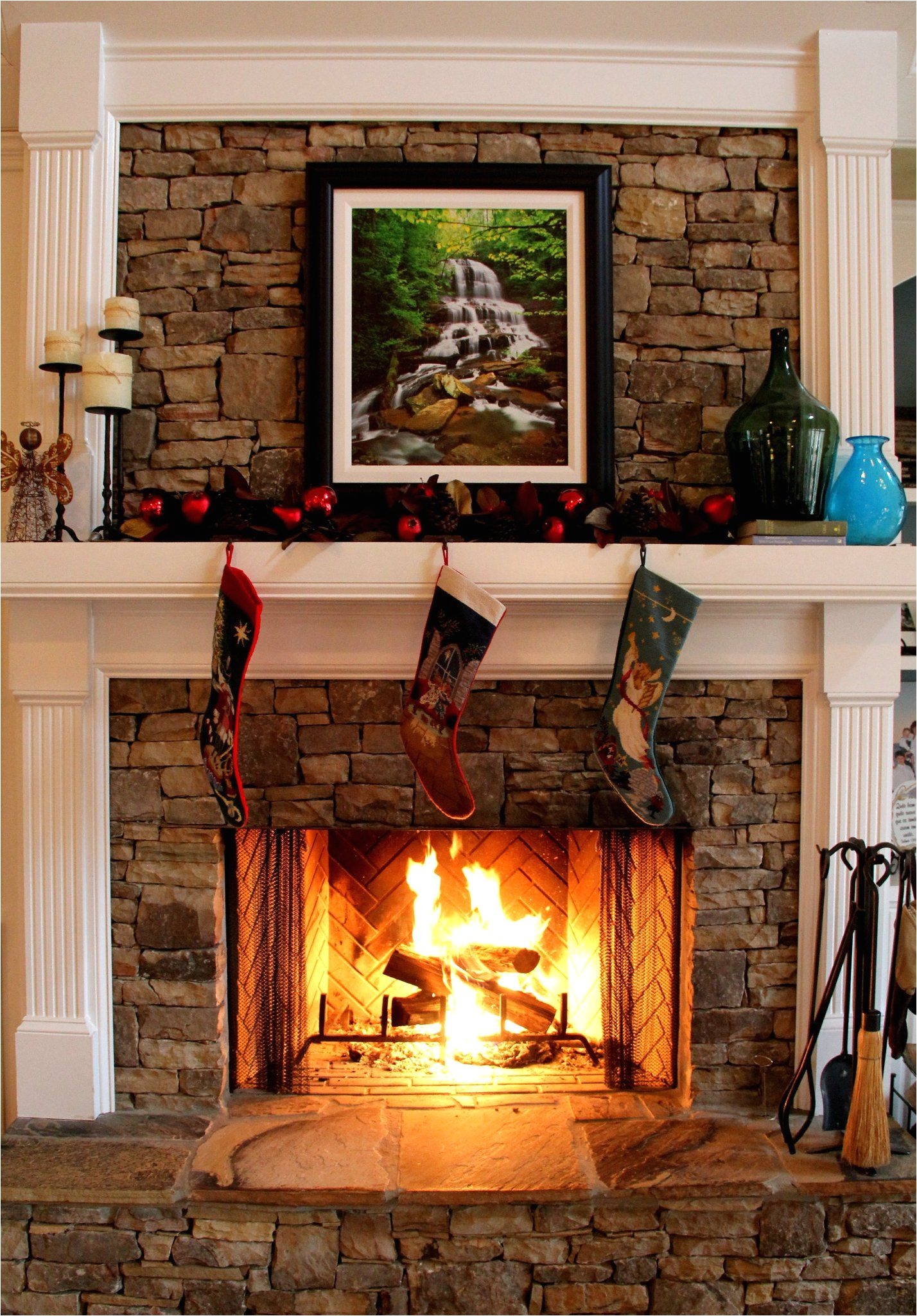 love the wood mixed with the fireplace adn the slate hearth whats with the picture