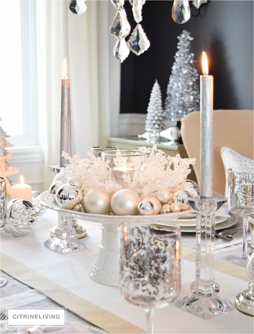 crisp whites and cool metallics are layered together for a fresh winter wonderland inspired holiday tablescape for christmas or new year s